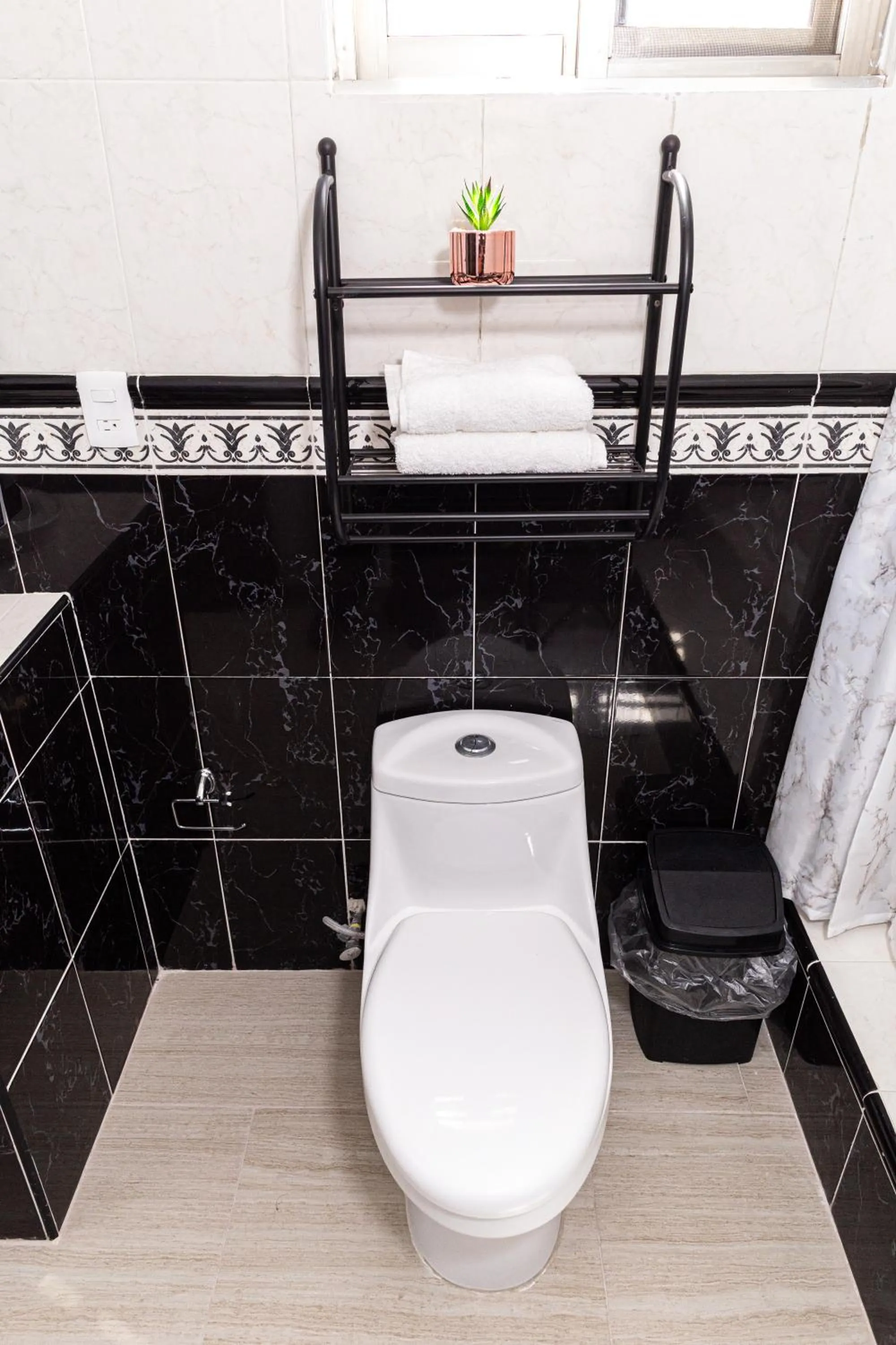 Bathroom in Santa Fe Studios And Suites