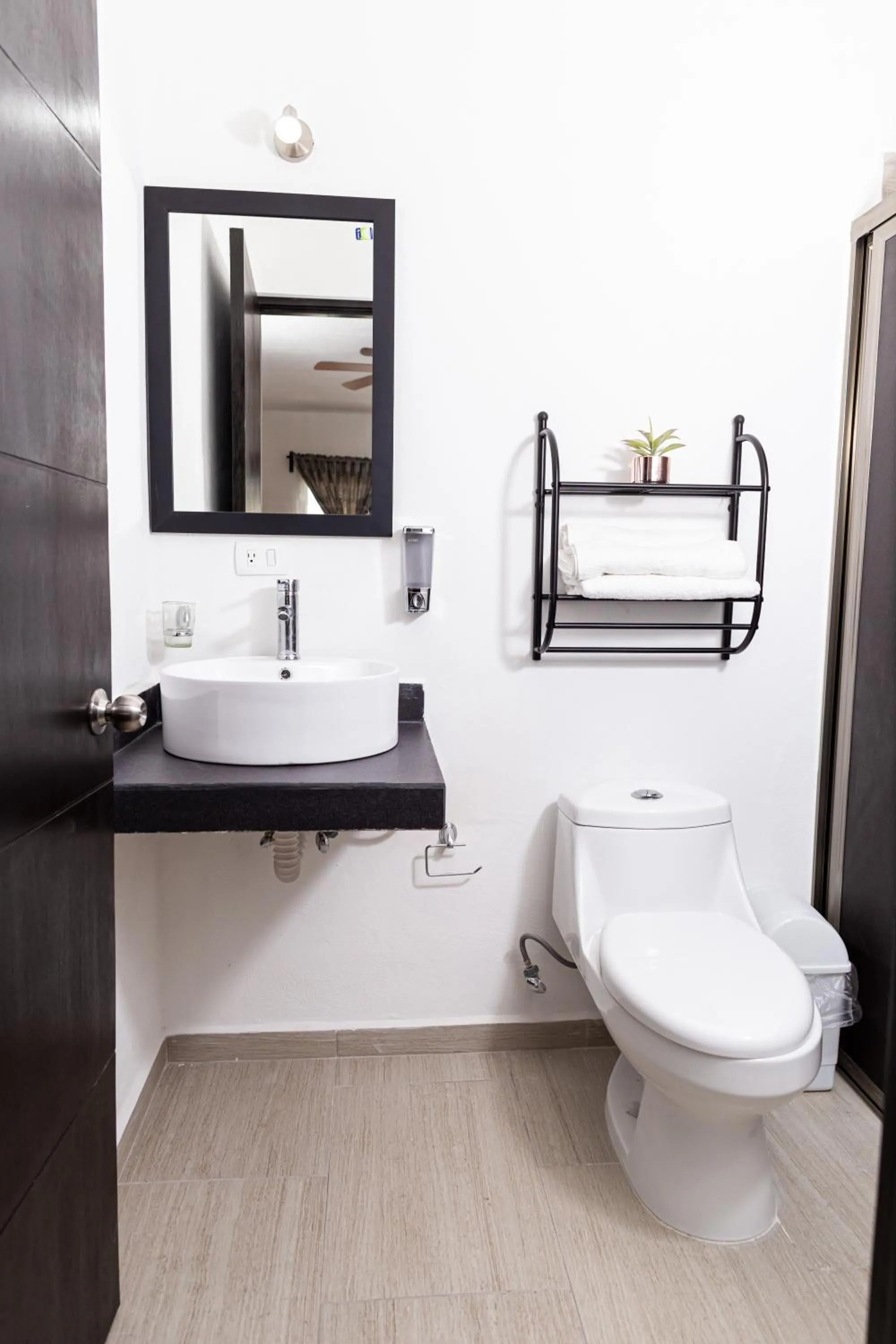Bathroom in Santa Fe Studios And Suites