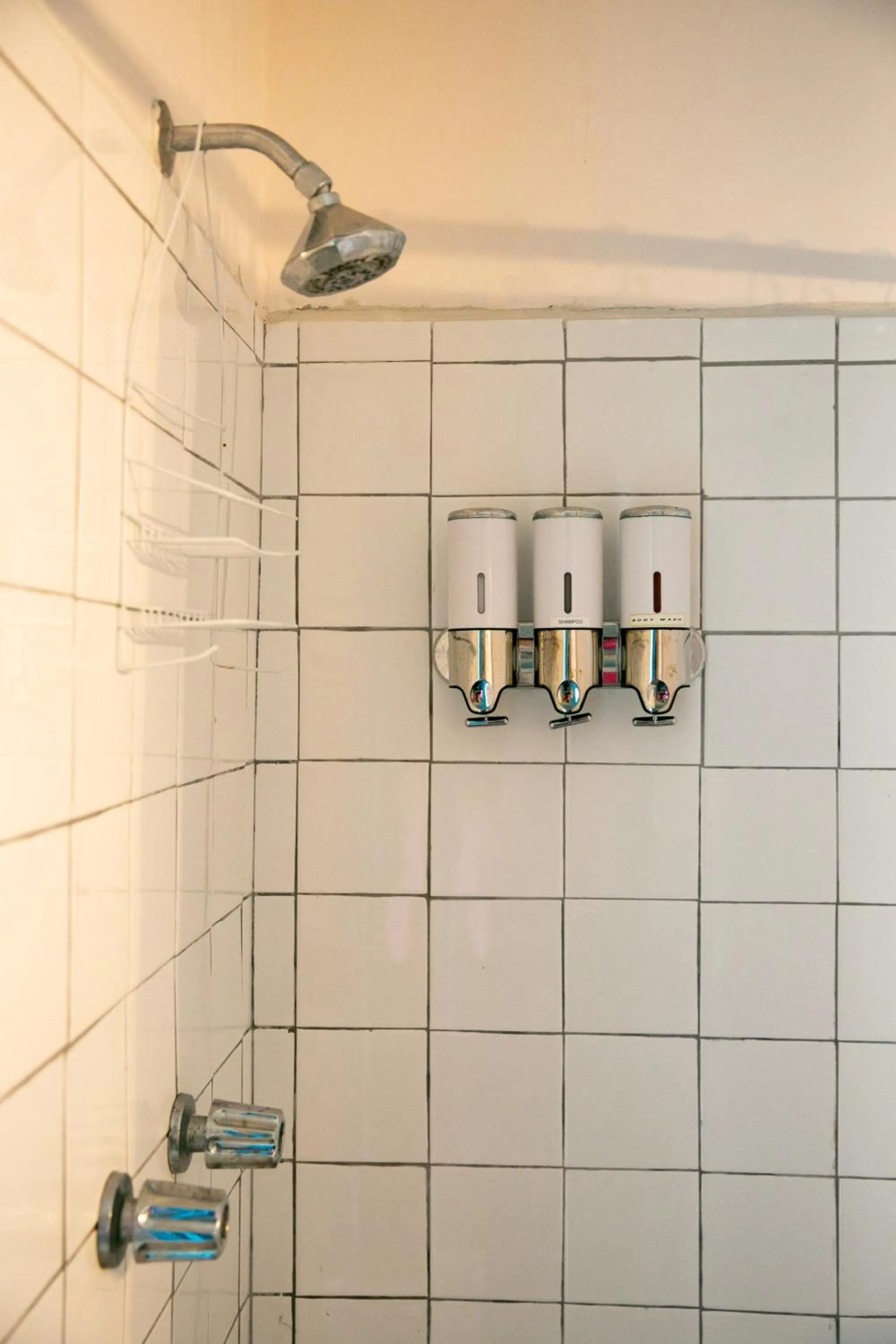 Shower in Numero Uno Beach Apartments