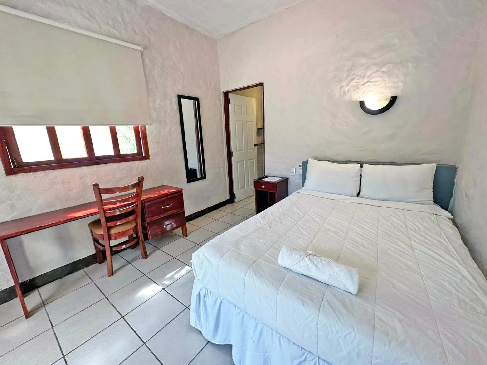 Bedroom in Surf Ranch Hotel & Resort