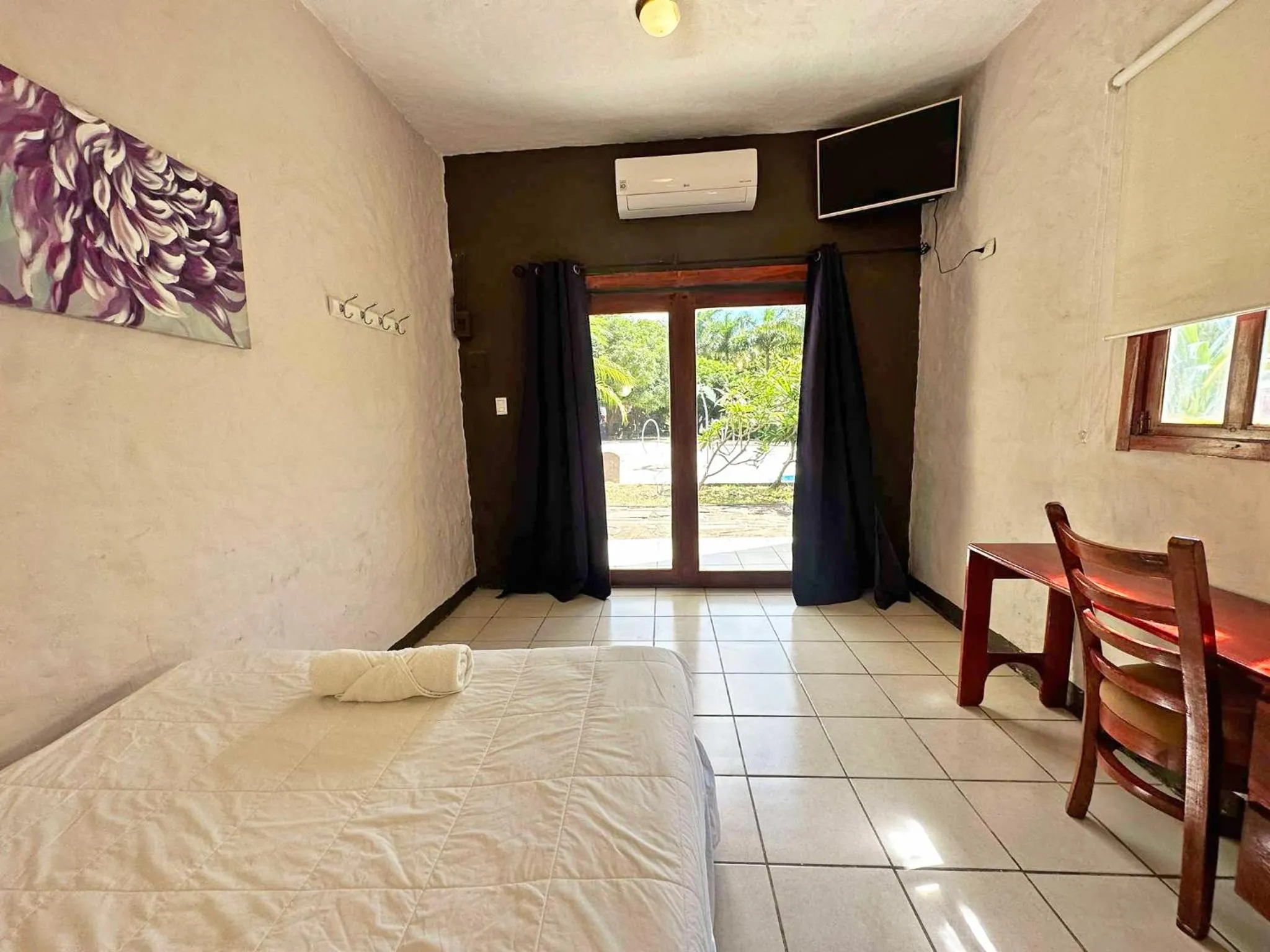 Bedroom in Surf Ranch Hotel & Resort