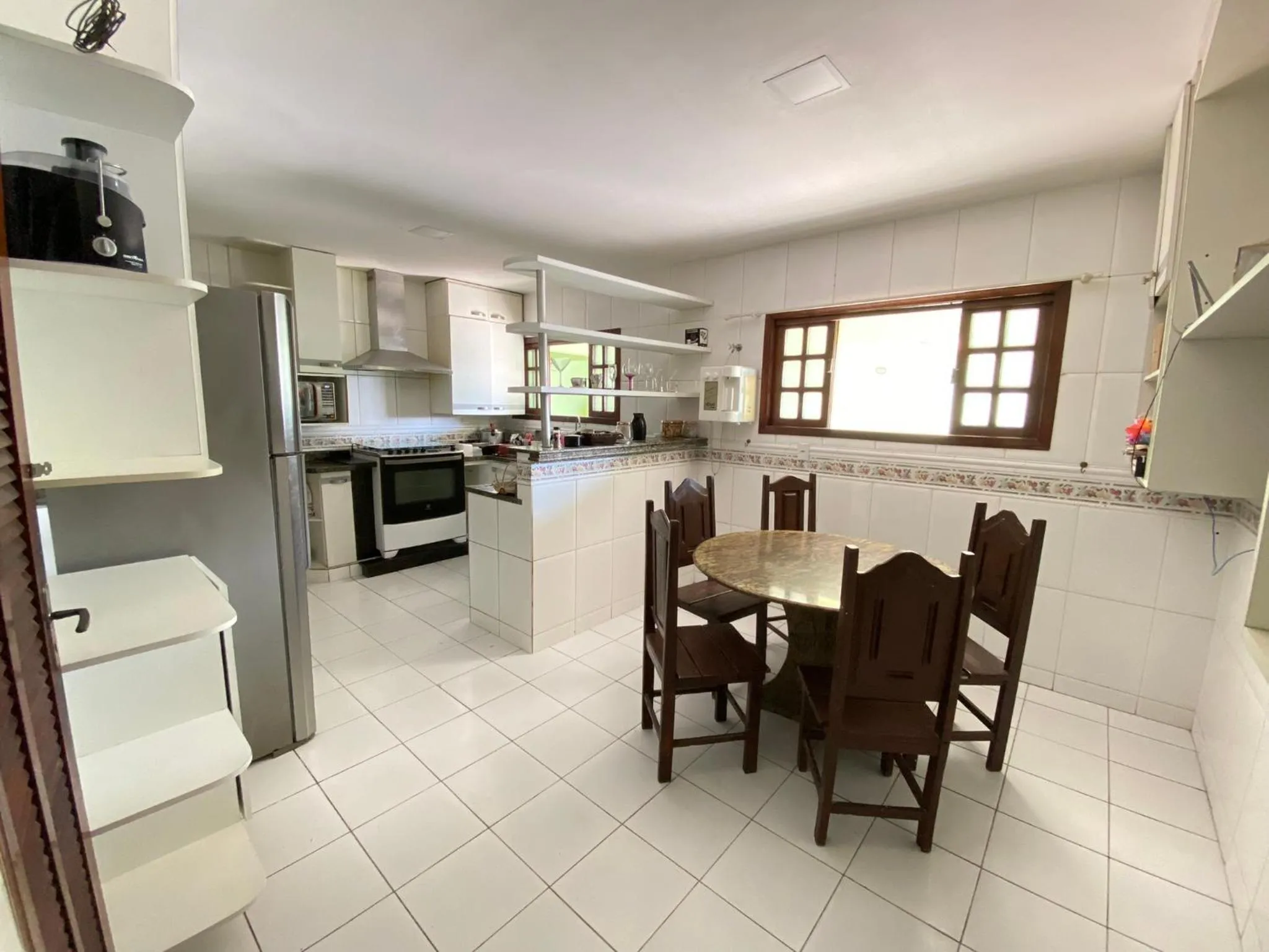 Kitchen or kitchenette in Pousada Queiroz