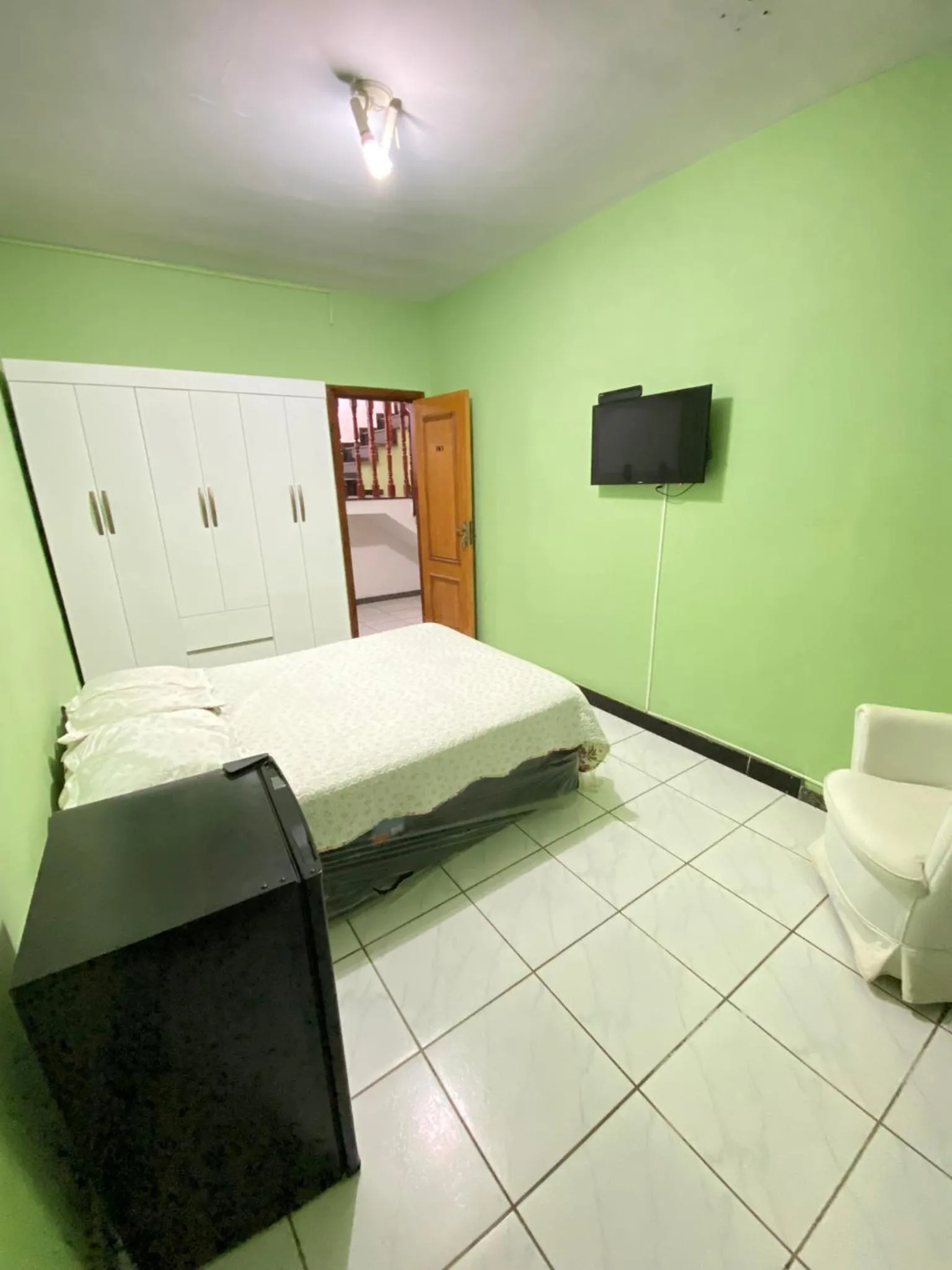 Bed in Pousada Queiroz