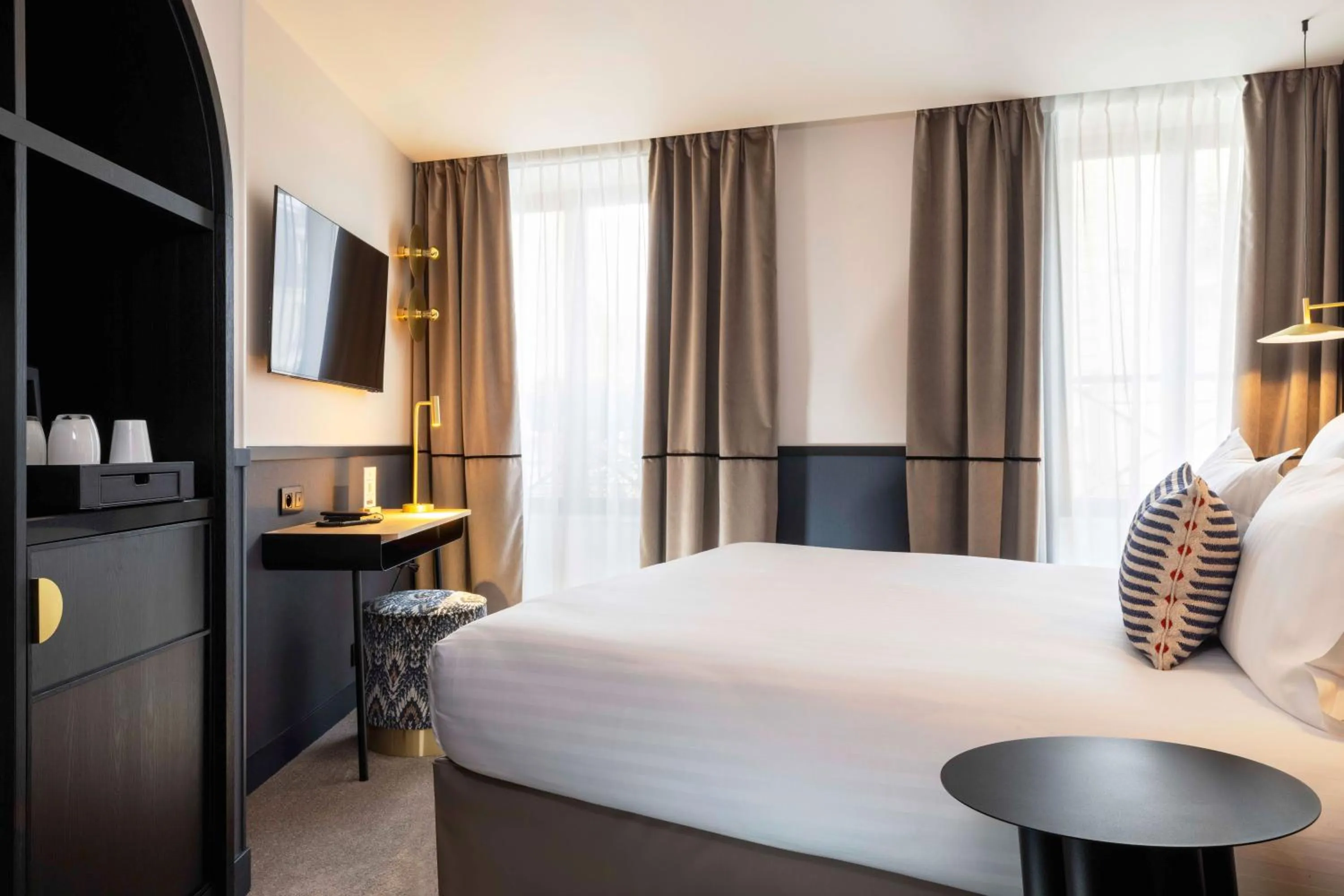 Bed in Hotel Grand Coeur Latin