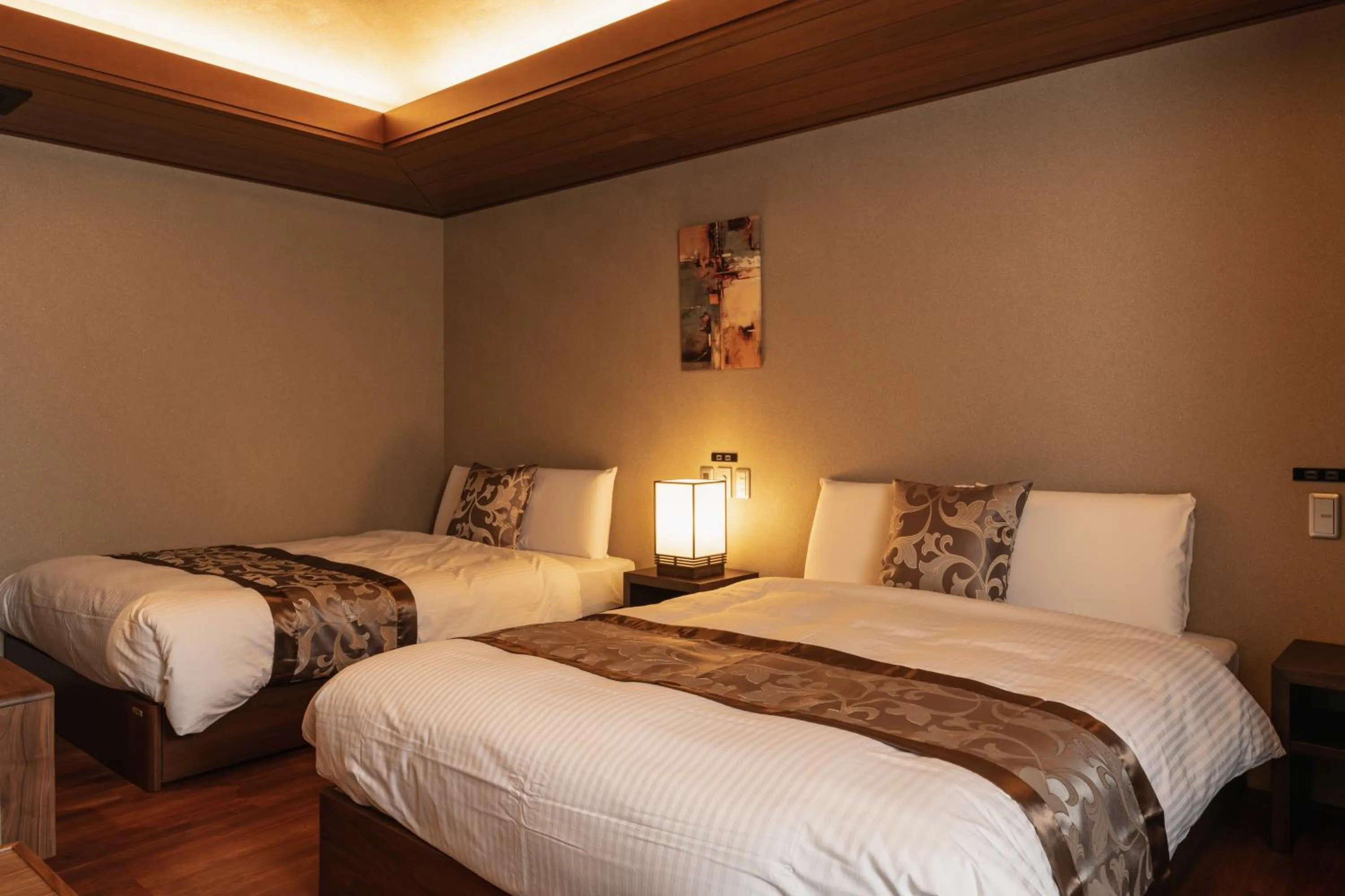 Bed in GRAND BASE Beppu