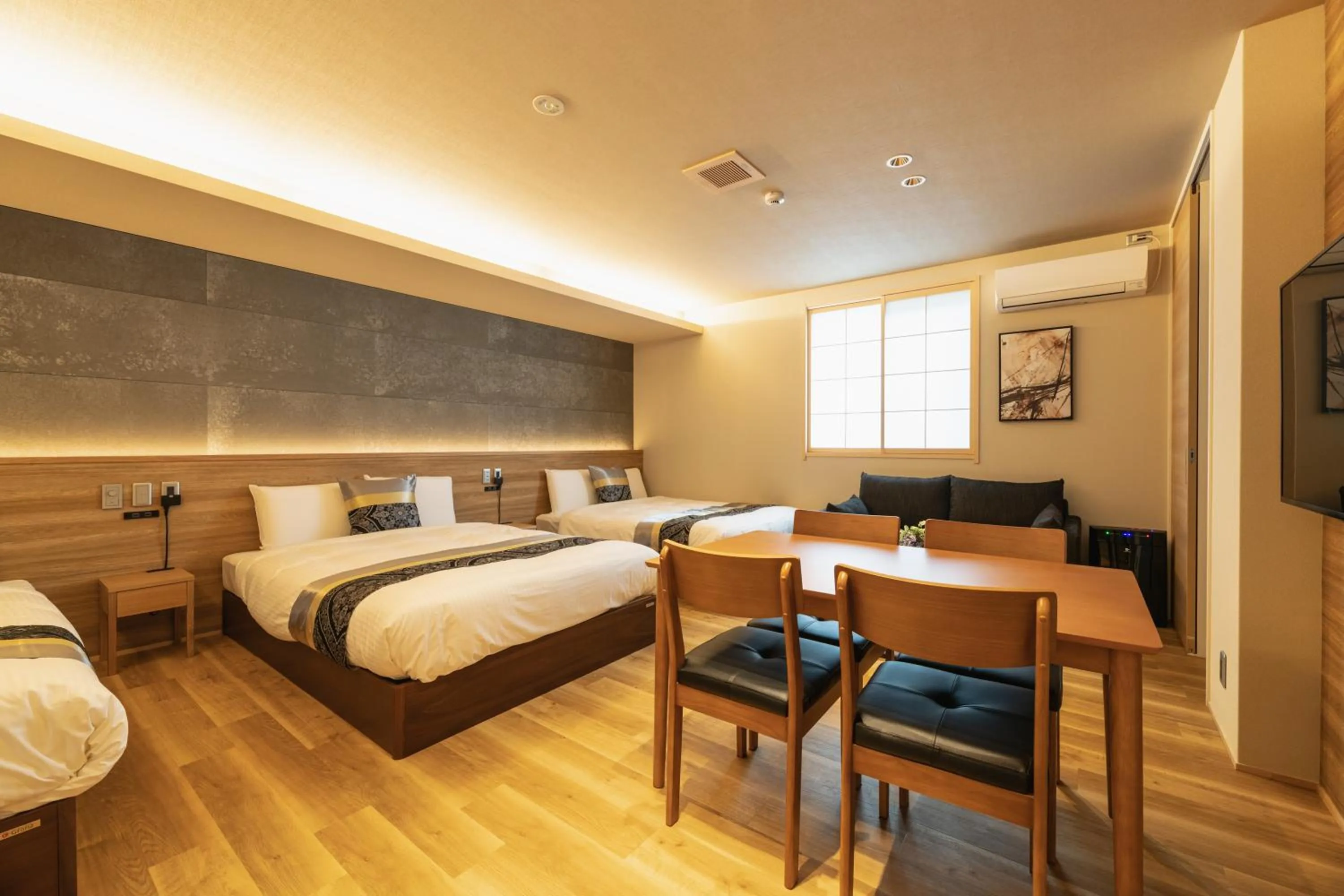 Photo of the whole room, Bed in GRAND BASE Beppu