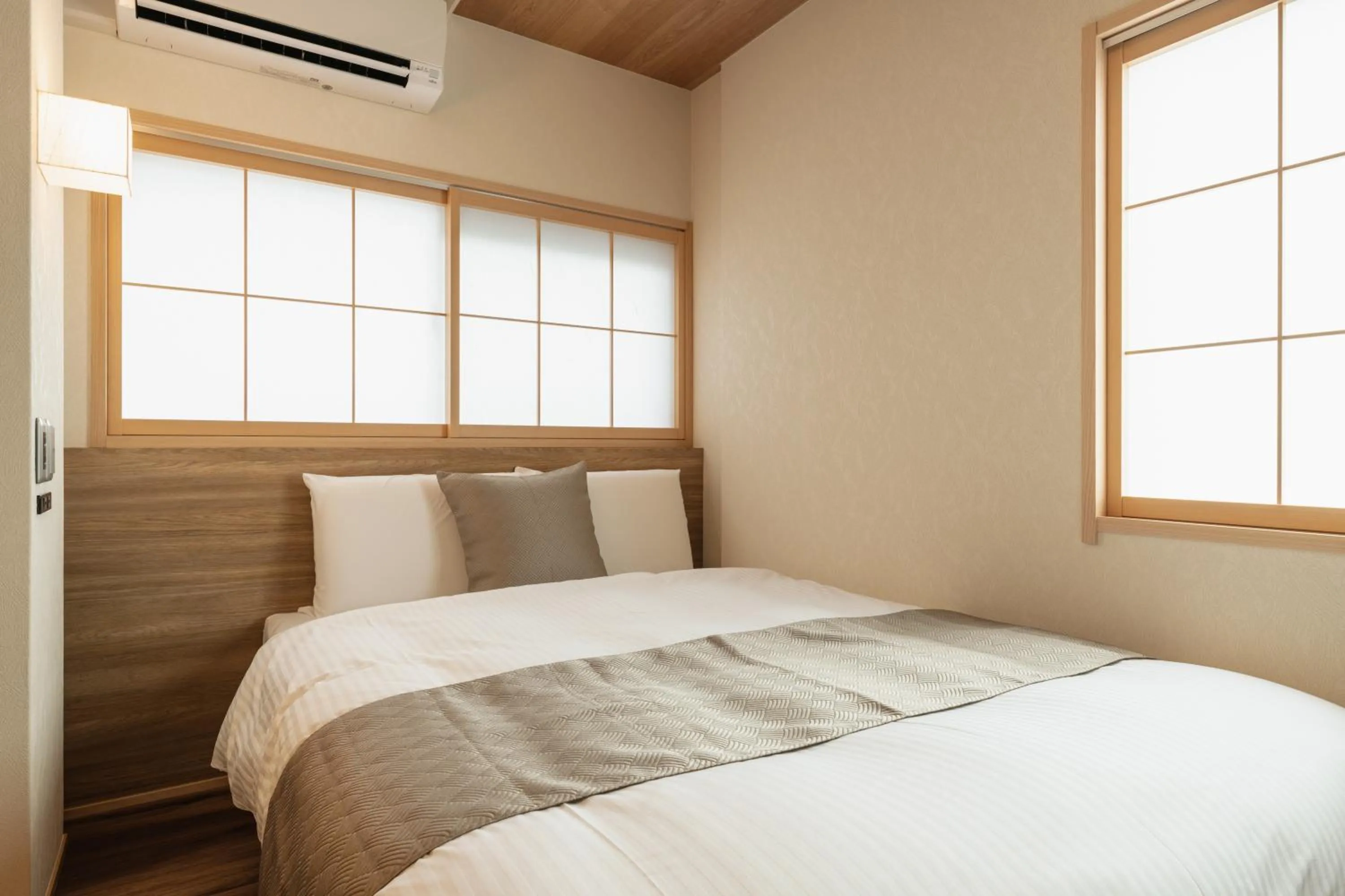 Bed in GRAND BASE Beppu