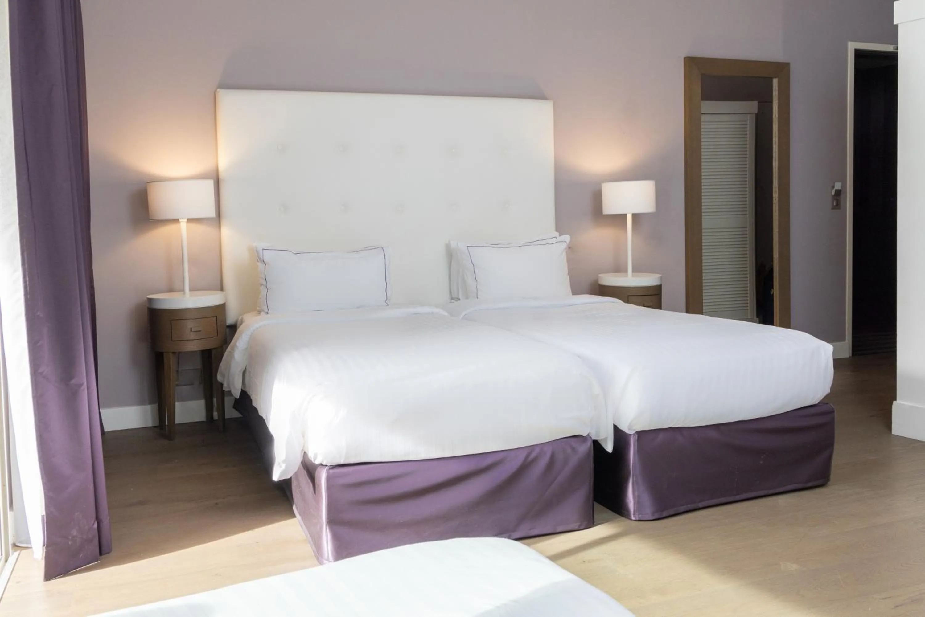 Bed in Hôtel Château des Tourelles - Relais Thalasso & Spa