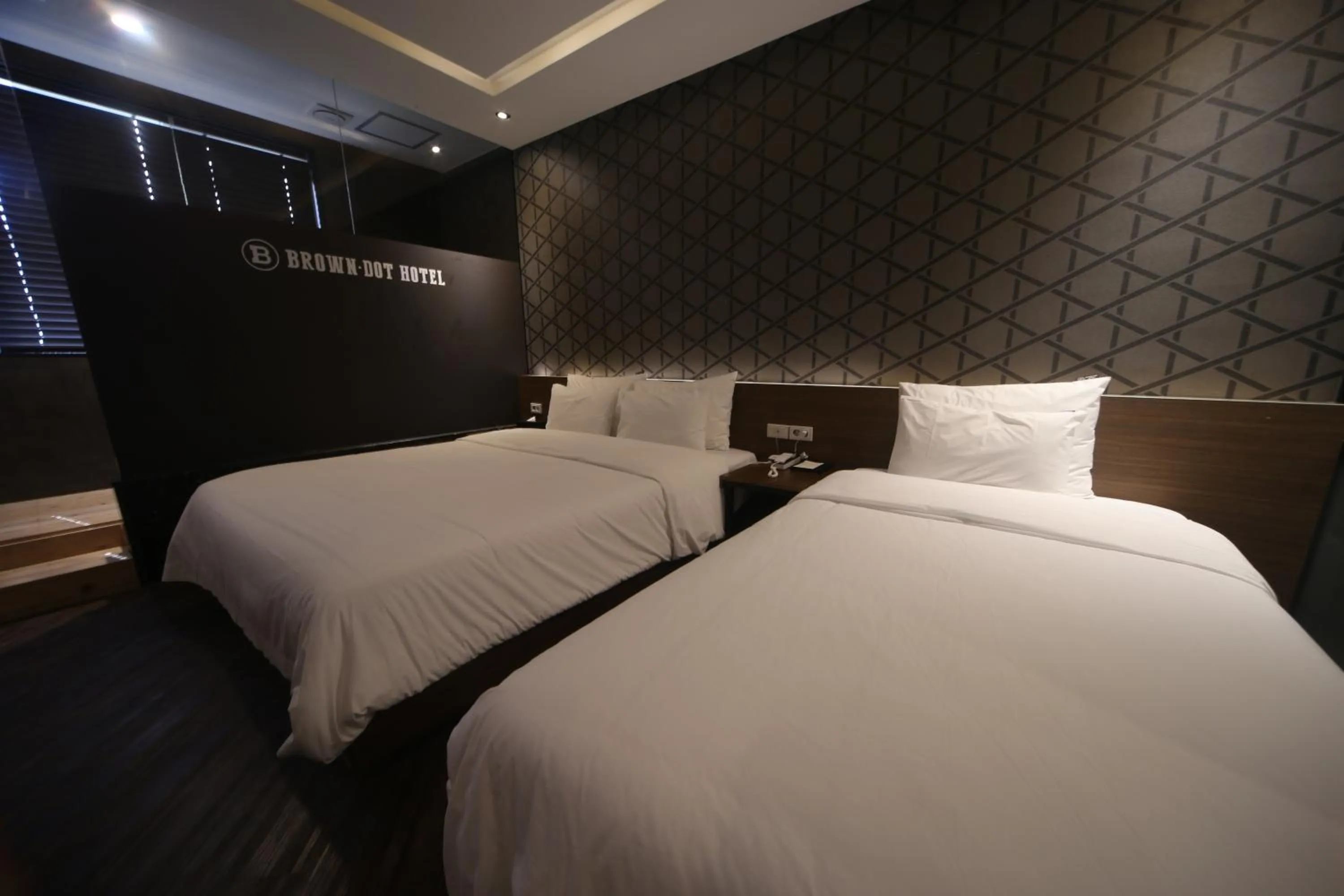 Bed in Beomil Brown Dot Hotel