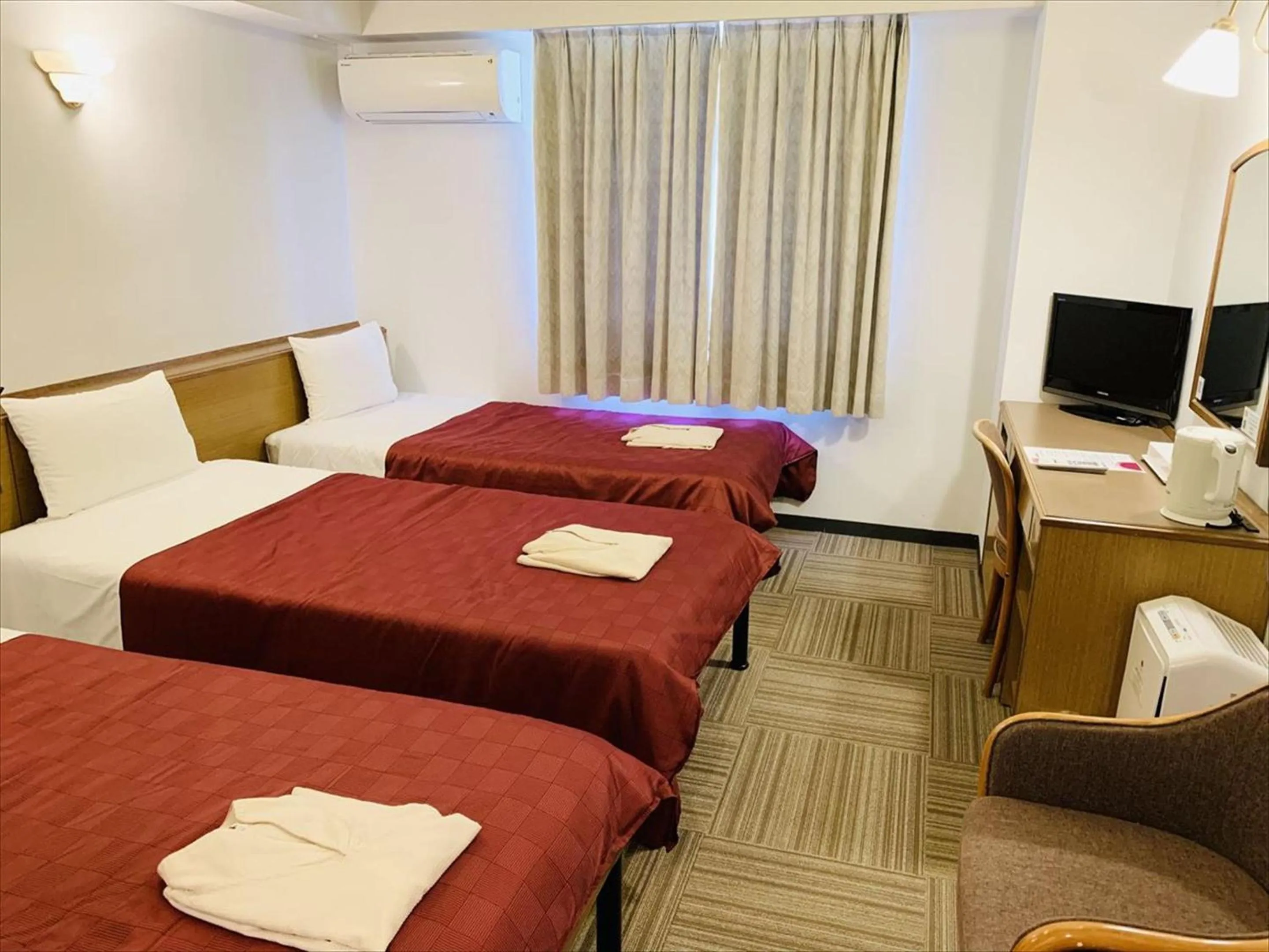 Bed in Okinawa Hotel