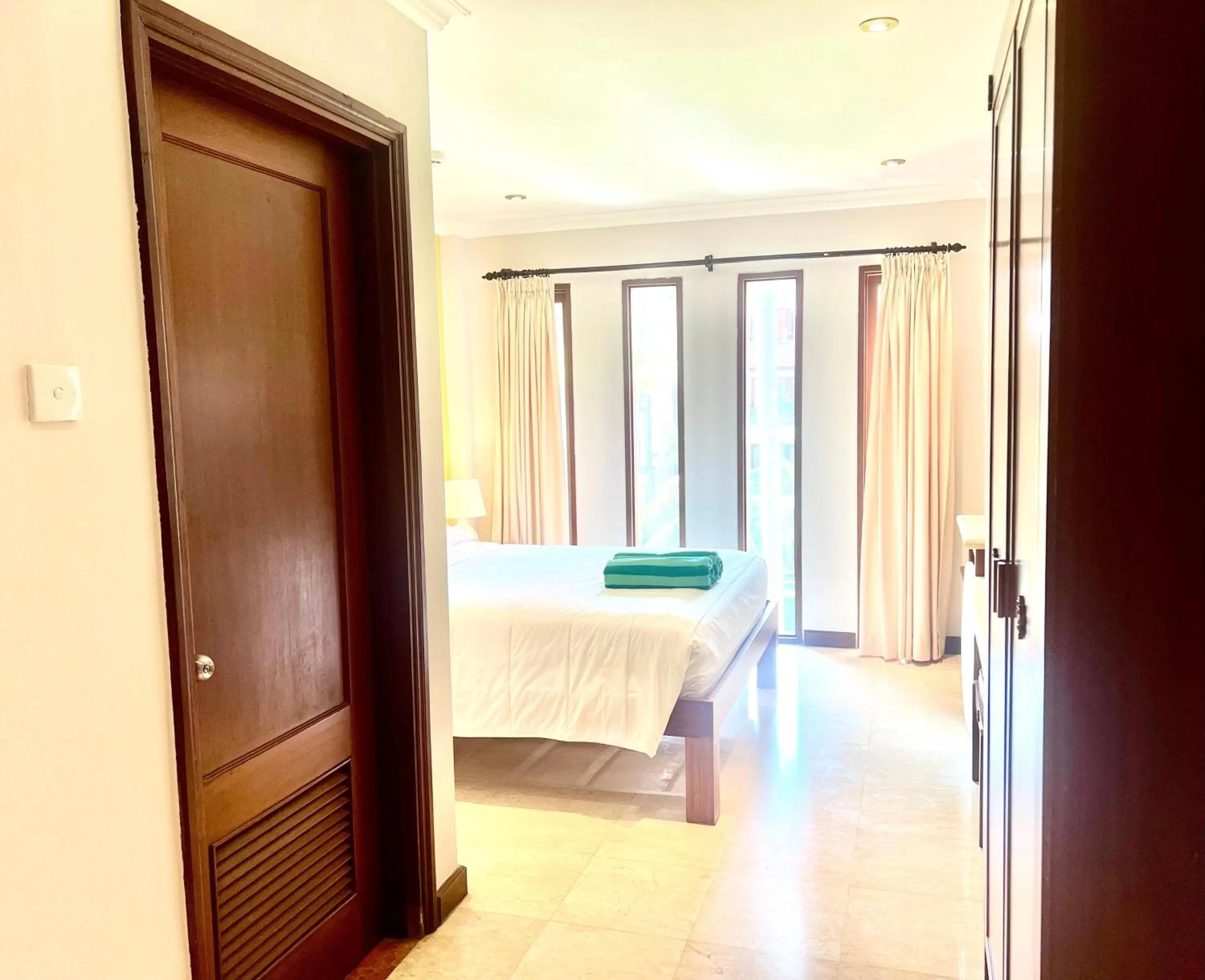 Bed in Peninsula Beach Resort