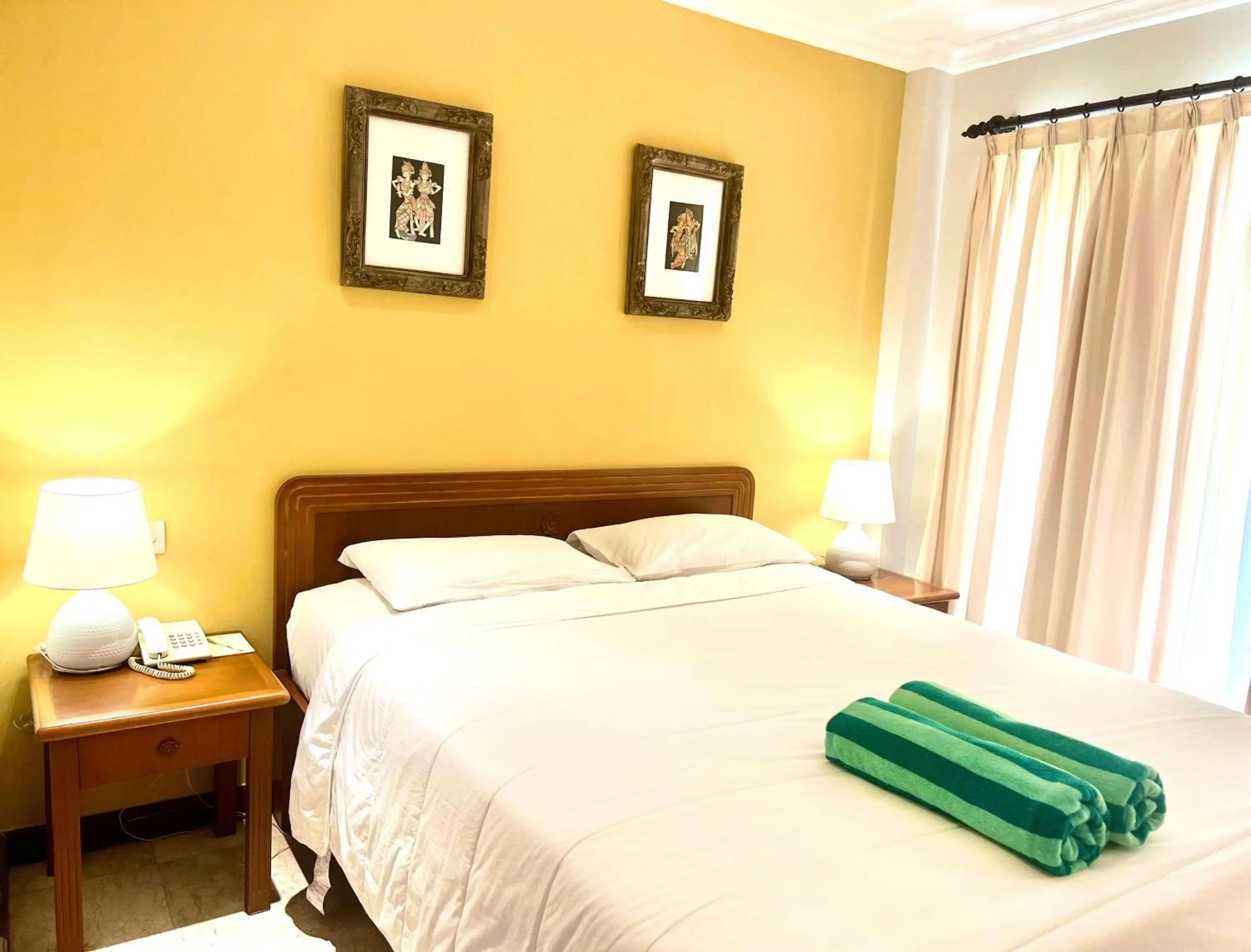 Bed in Peninsula Beach Resort