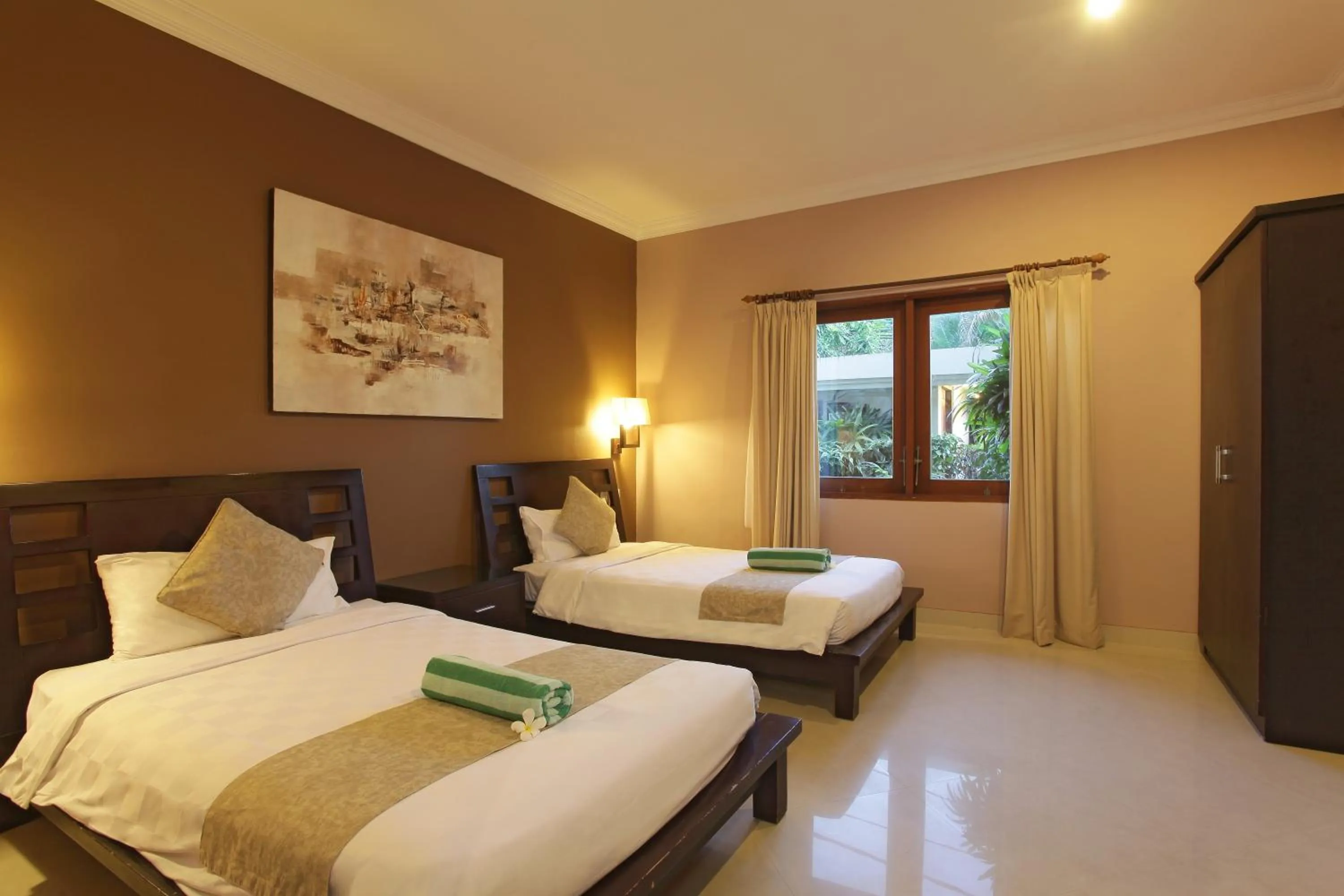 Bed in Peninsula Beach Resort