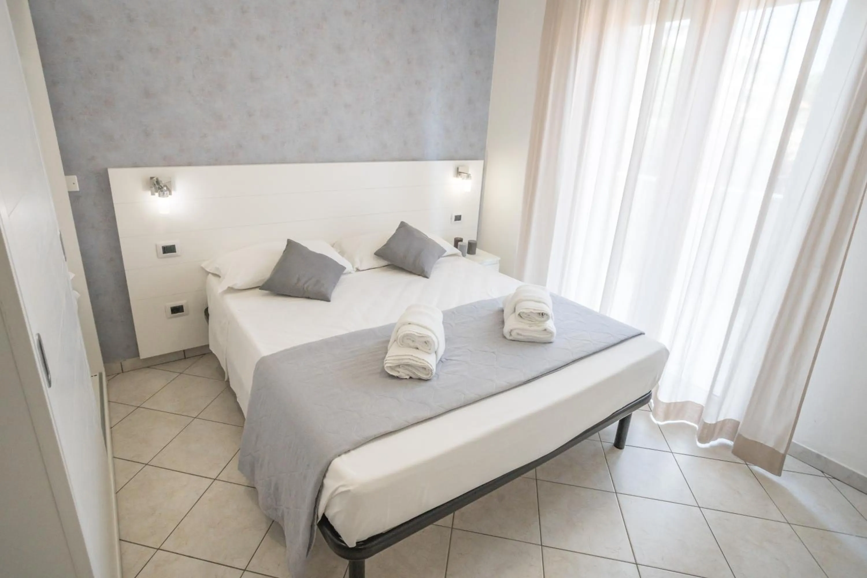 Bed in Rimini Bay Suites&Residence