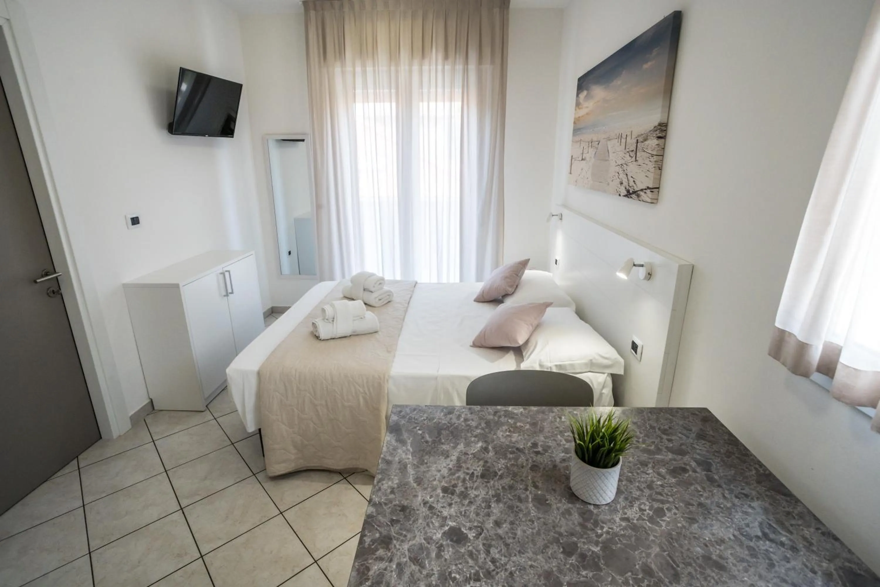 Bed in Rimini Bay Suites&Residence