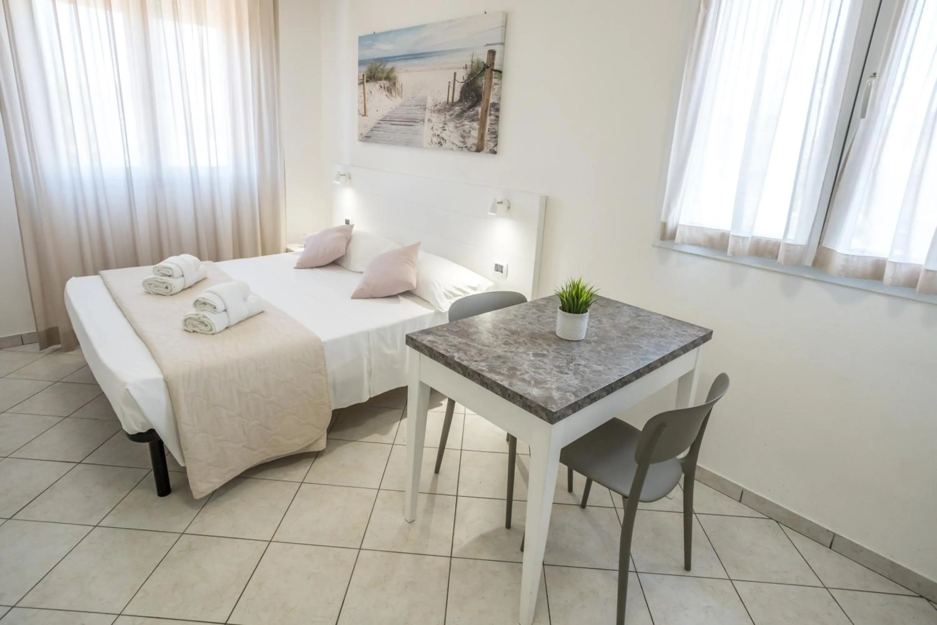 Bed in Rimini Bay Suites&Residence