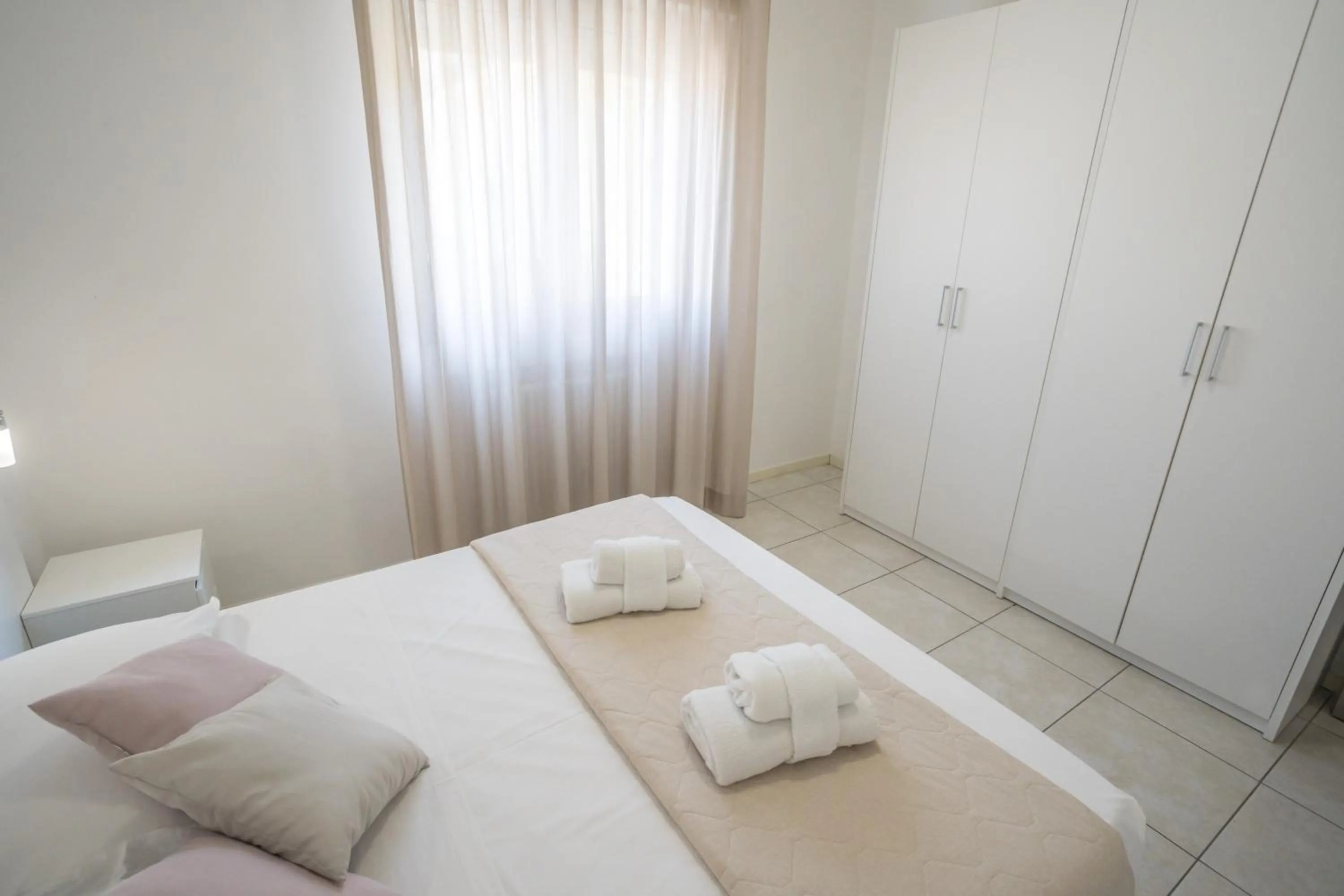 Bed in Rimini Bay Suites&Residence