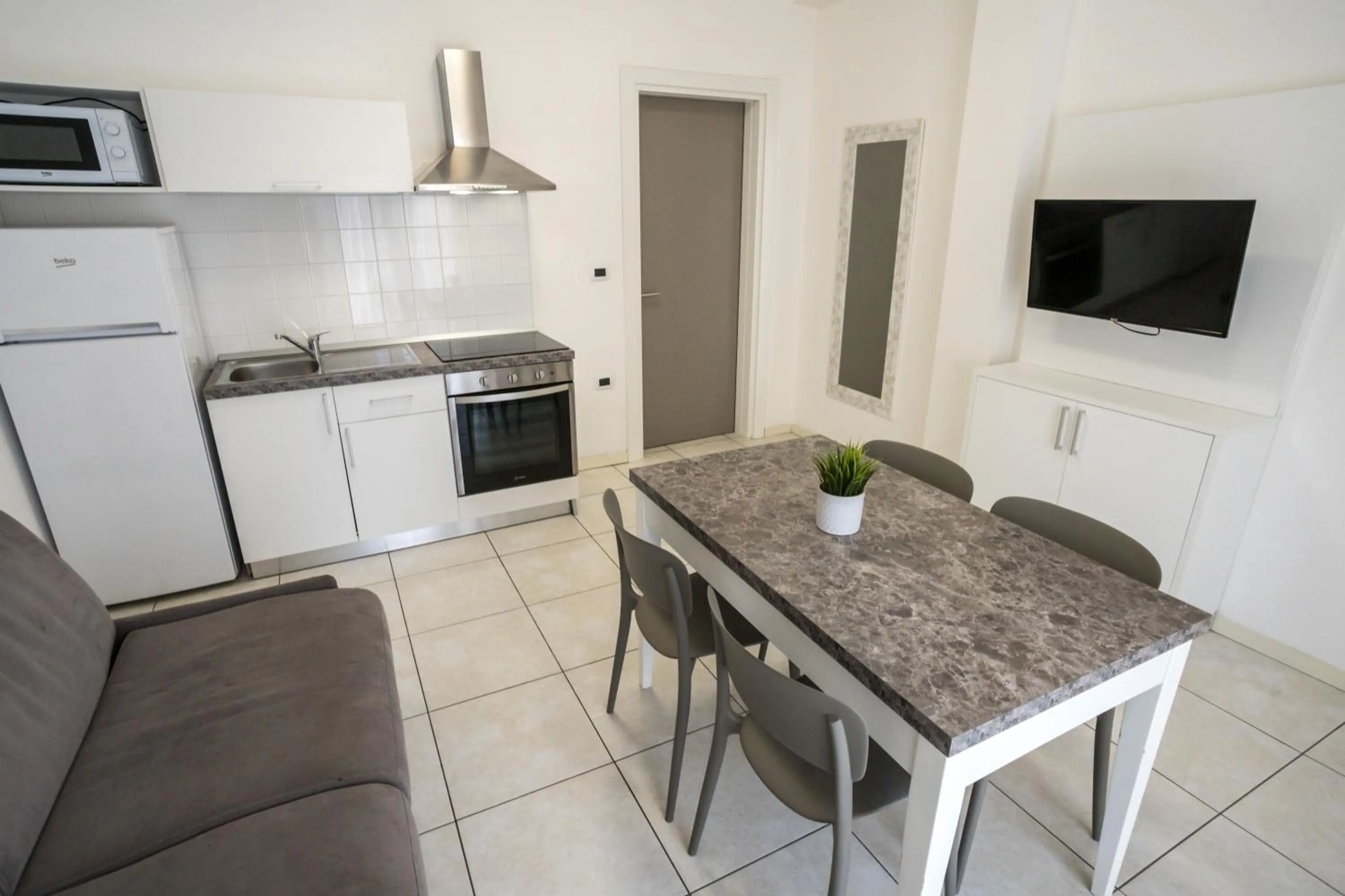 Kitchen or kitchenette in Rimini Bay Suites&Residence