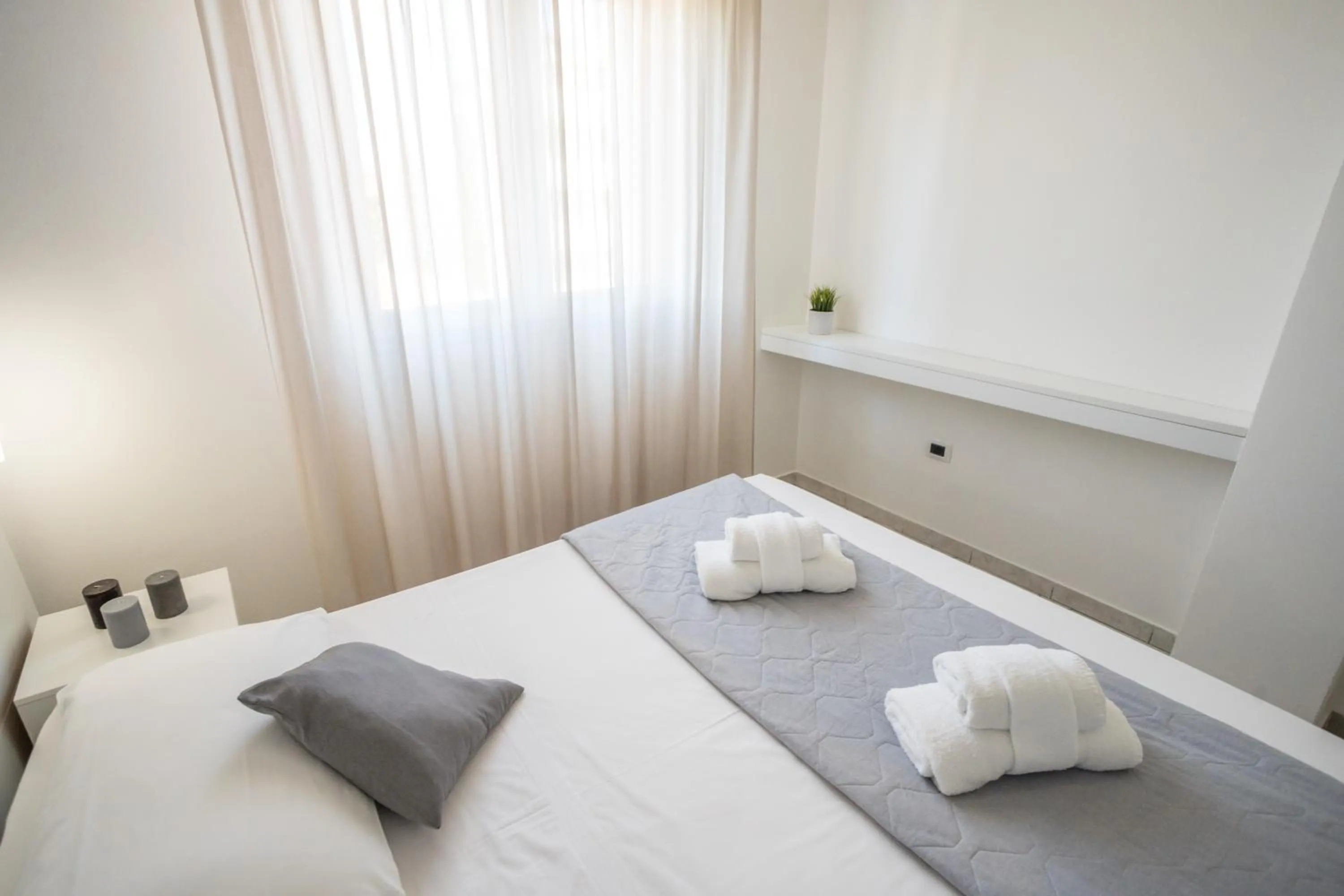Bed in Rimini Bay Suites&Residence