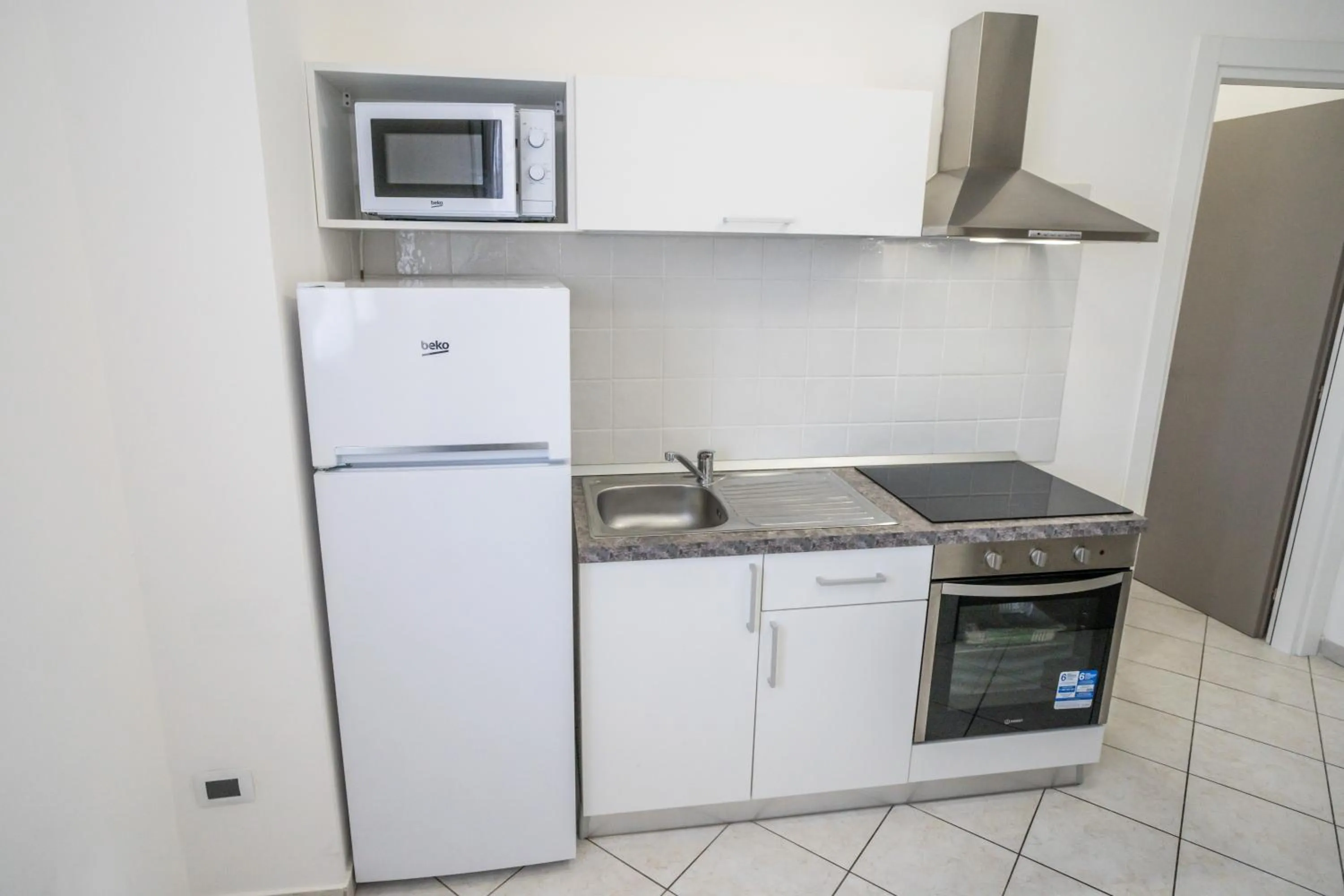 Kitchen or kitchenette in Rimini Bay Suites&Residence