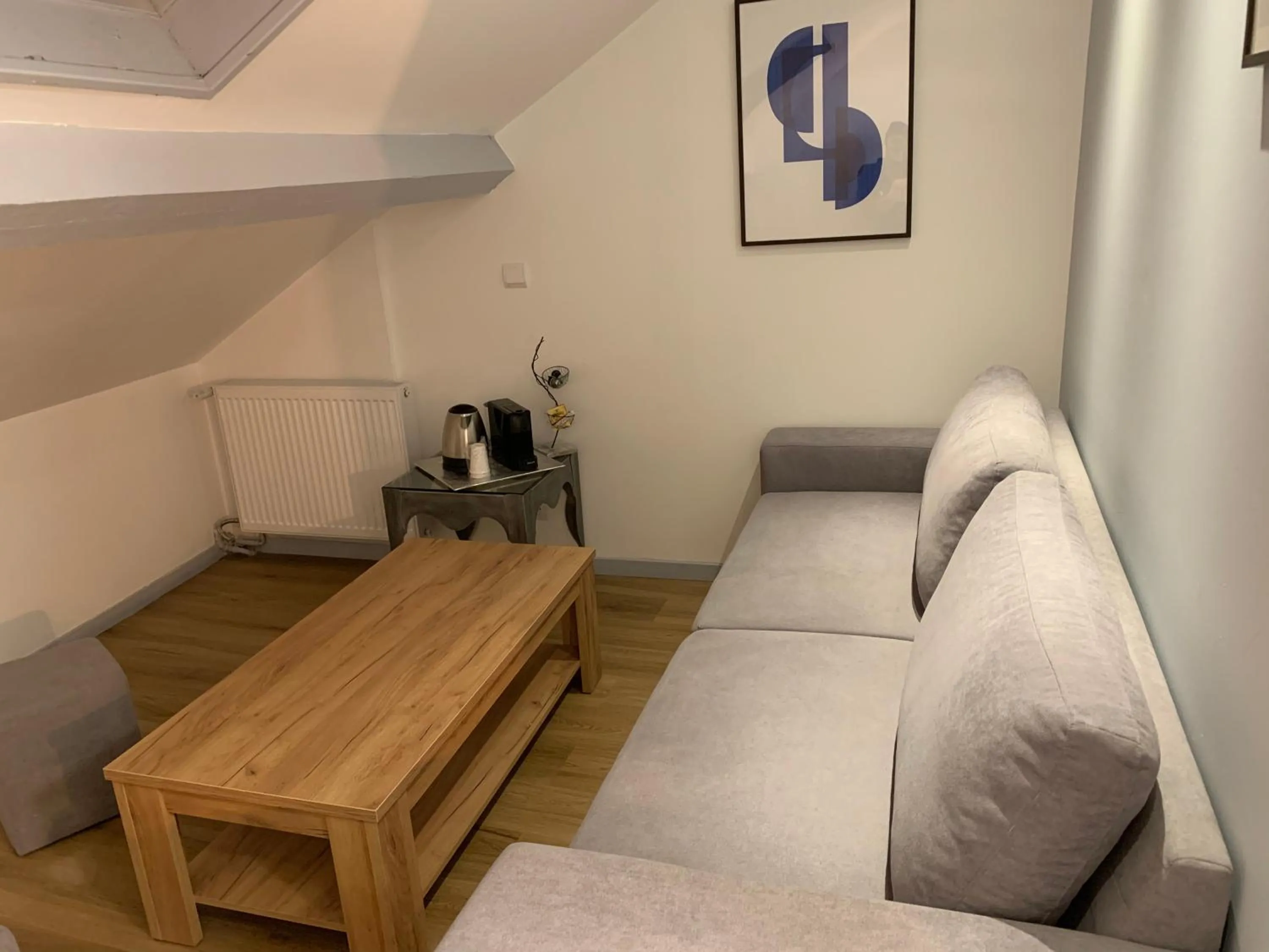 Living room in Initial by balladins, Hôtel Restaurant Broisin