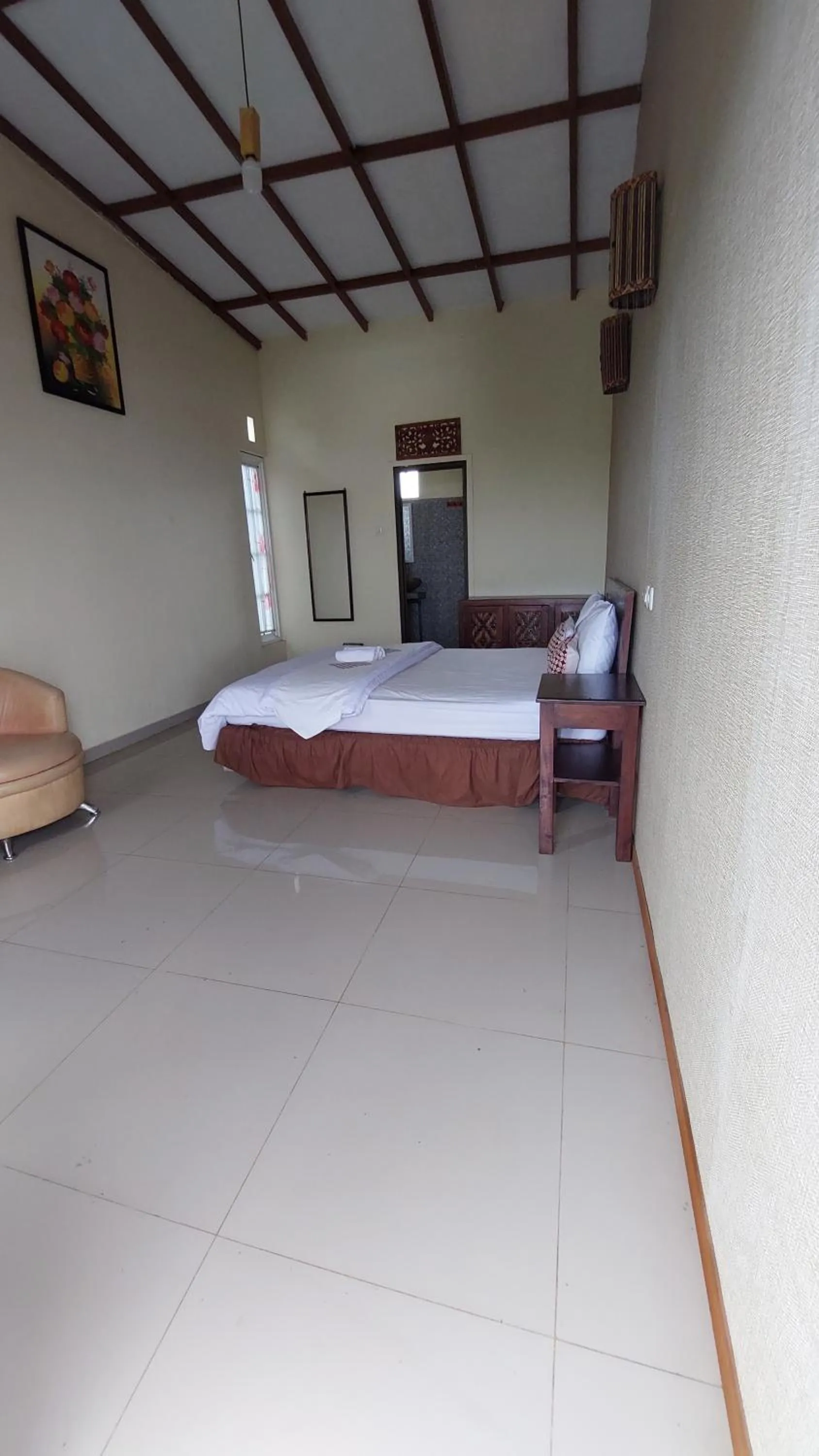 Bed in Bliss family cottage Batu