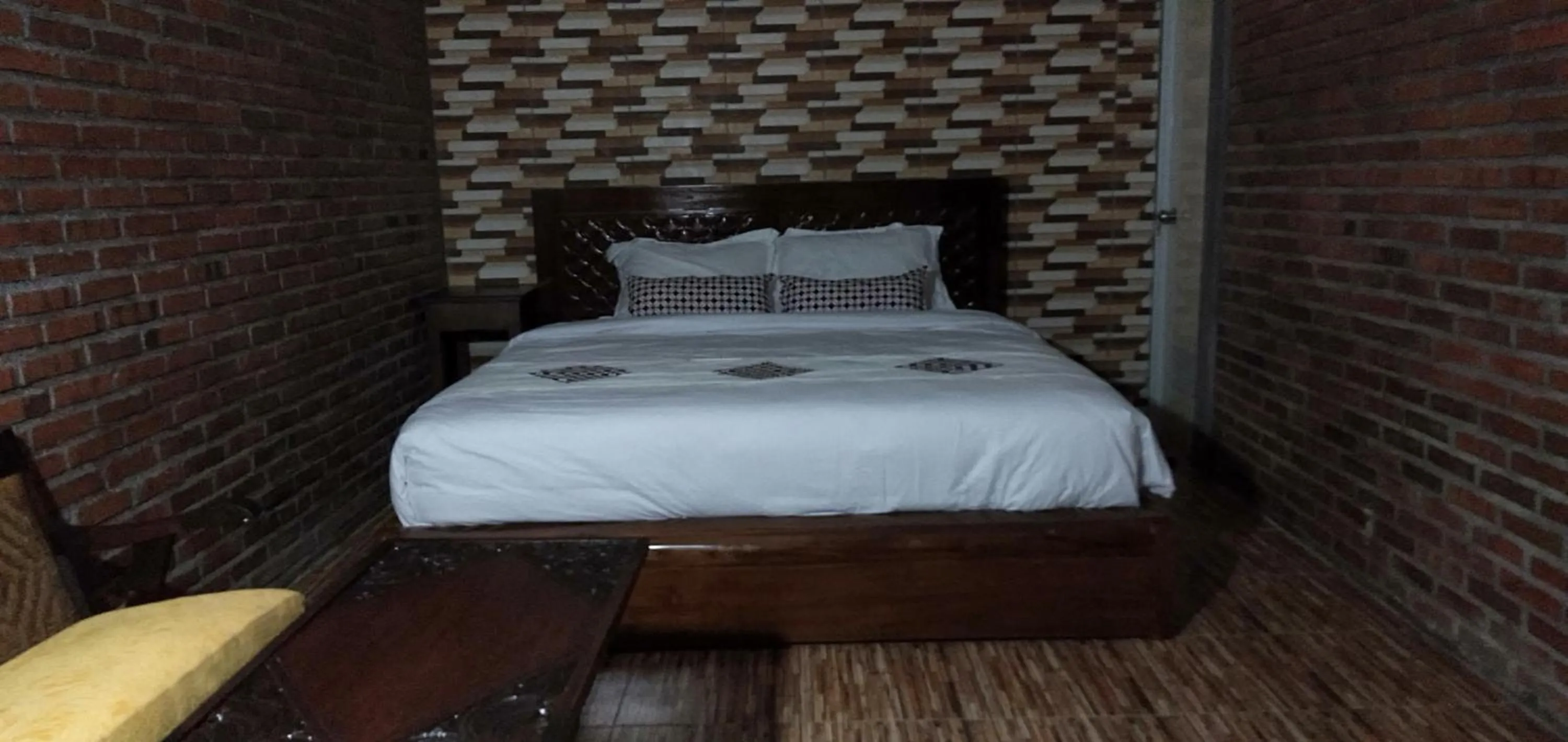 Bed in Bliss family cottage Batu