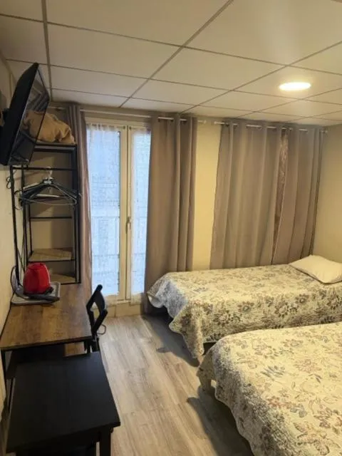 Bed in Hôtel Jarry Confort