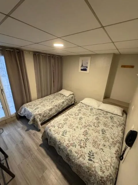 Bed in Hôtel Jarry Confort