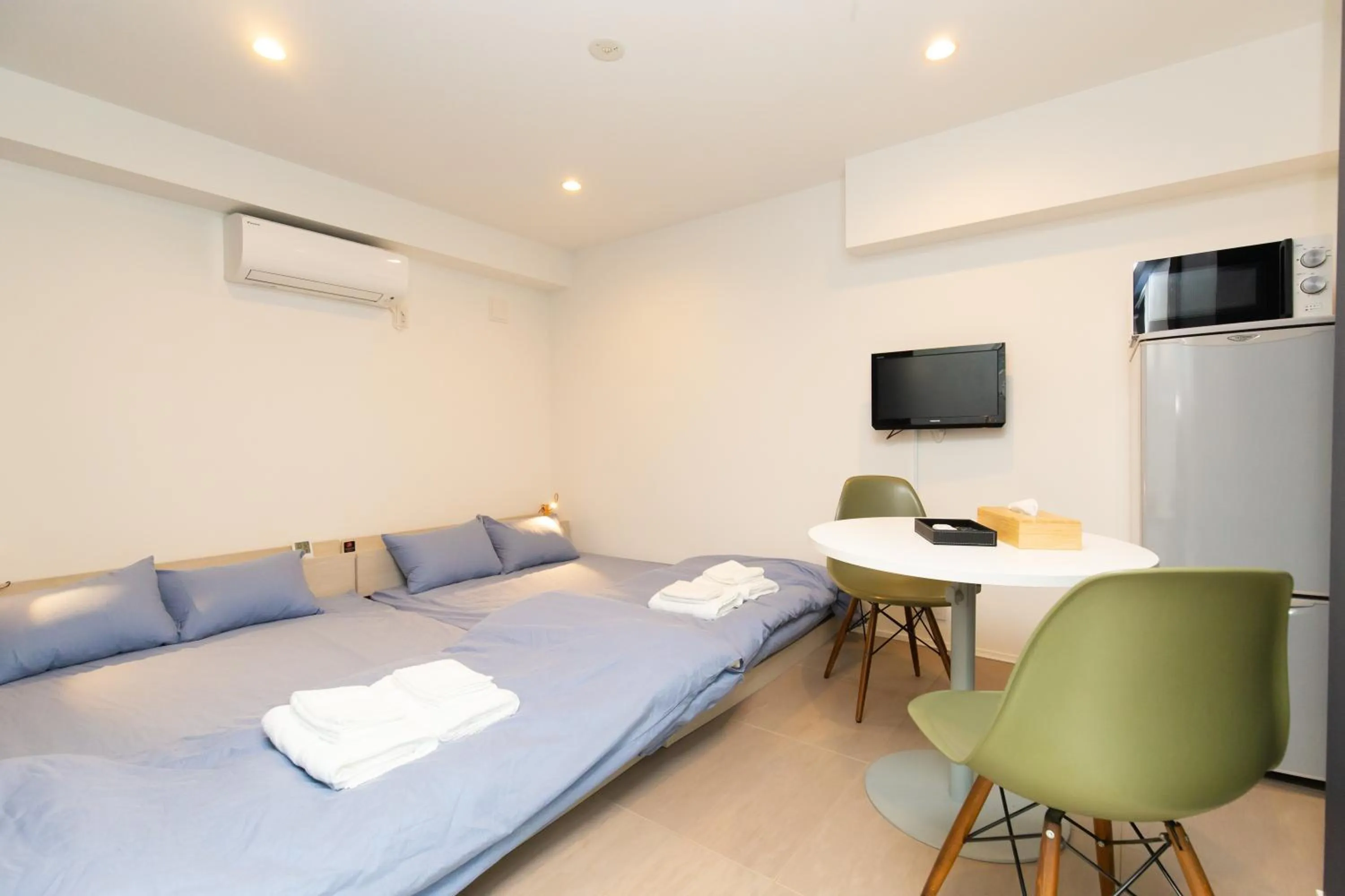 Photo of the whole room, Bed in Cross Bridge Ikebukuro