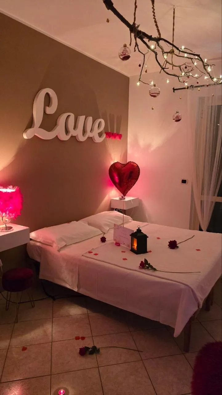 Bed in Andale SuiteSpa