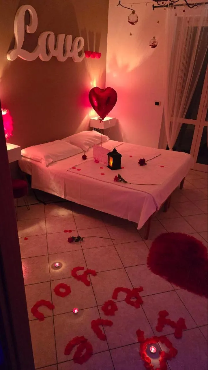 Bed in Andale SuiteSpa