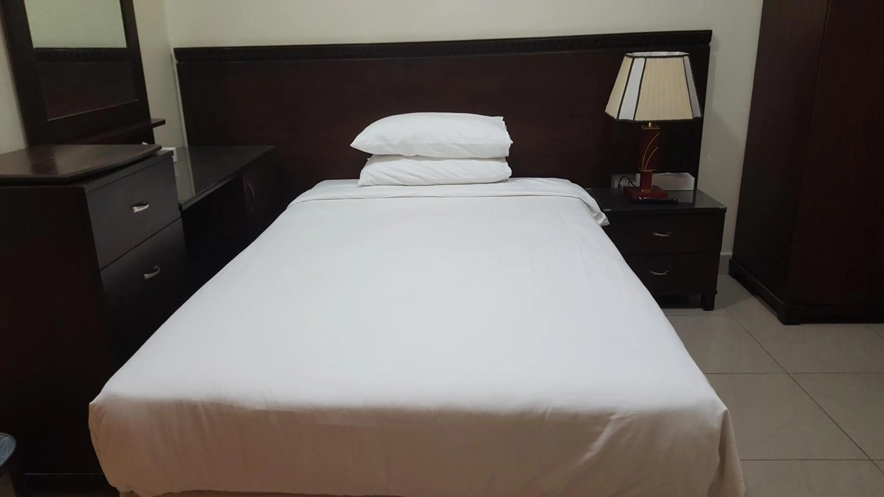 Bed in Al Muntazah Plaza Hotel