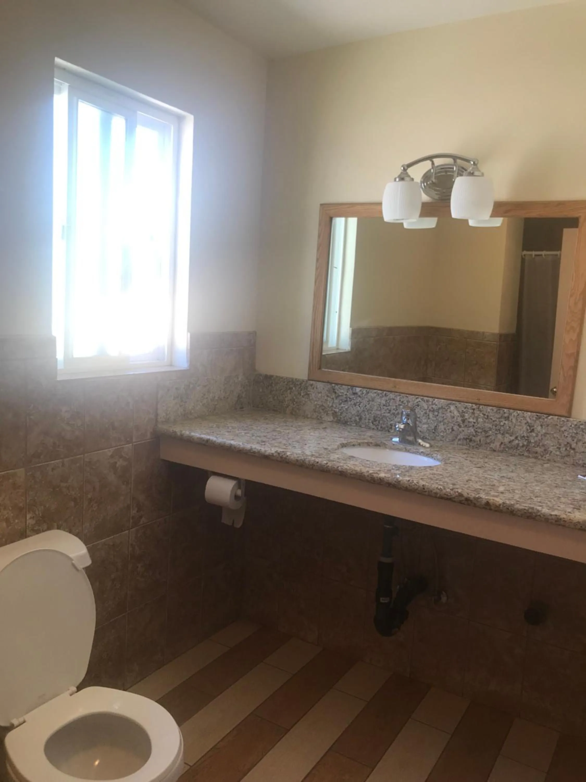 Shower in All 8 Motel