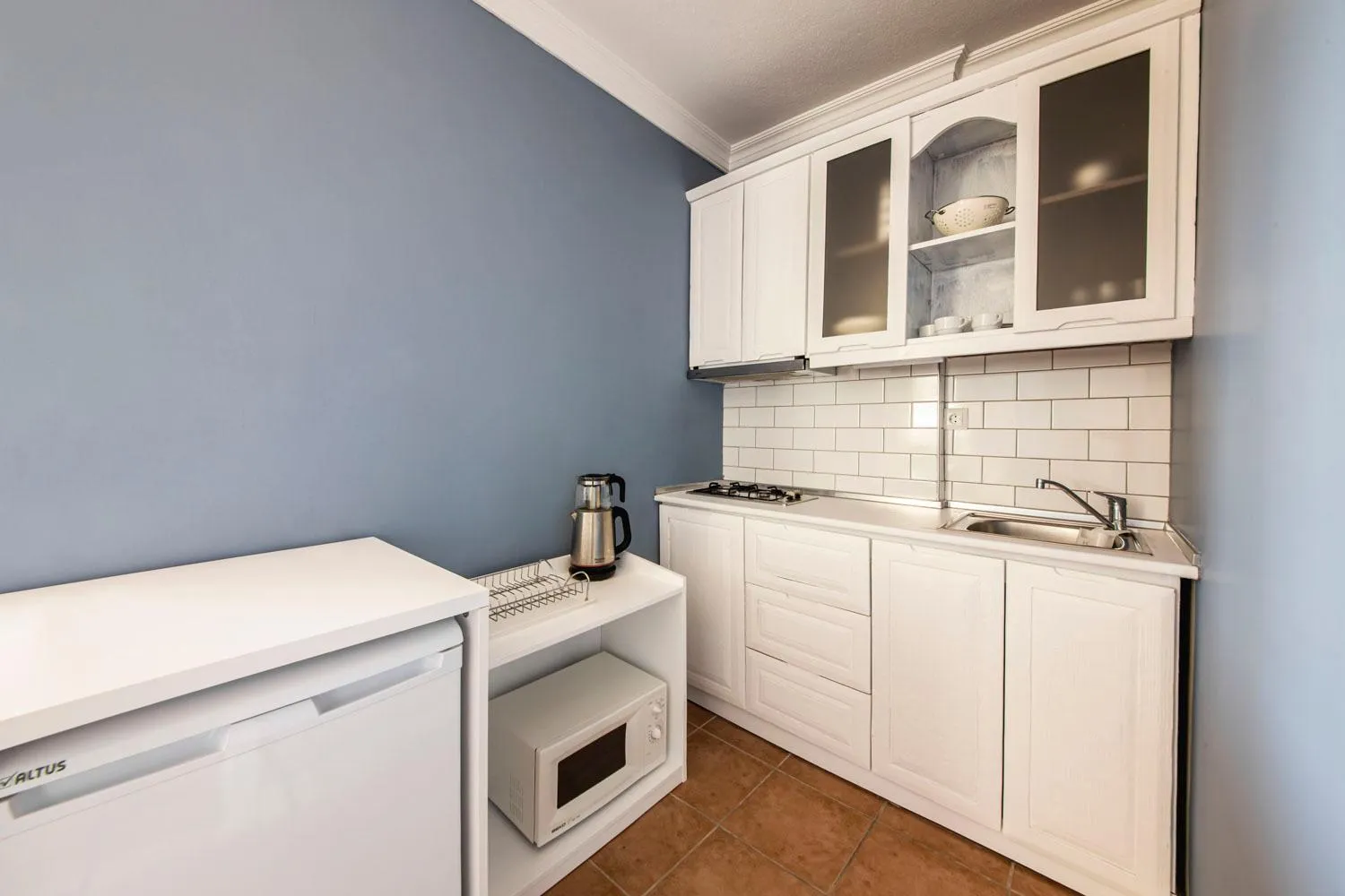 Kitchen or kitchenette in Lantana Aparts