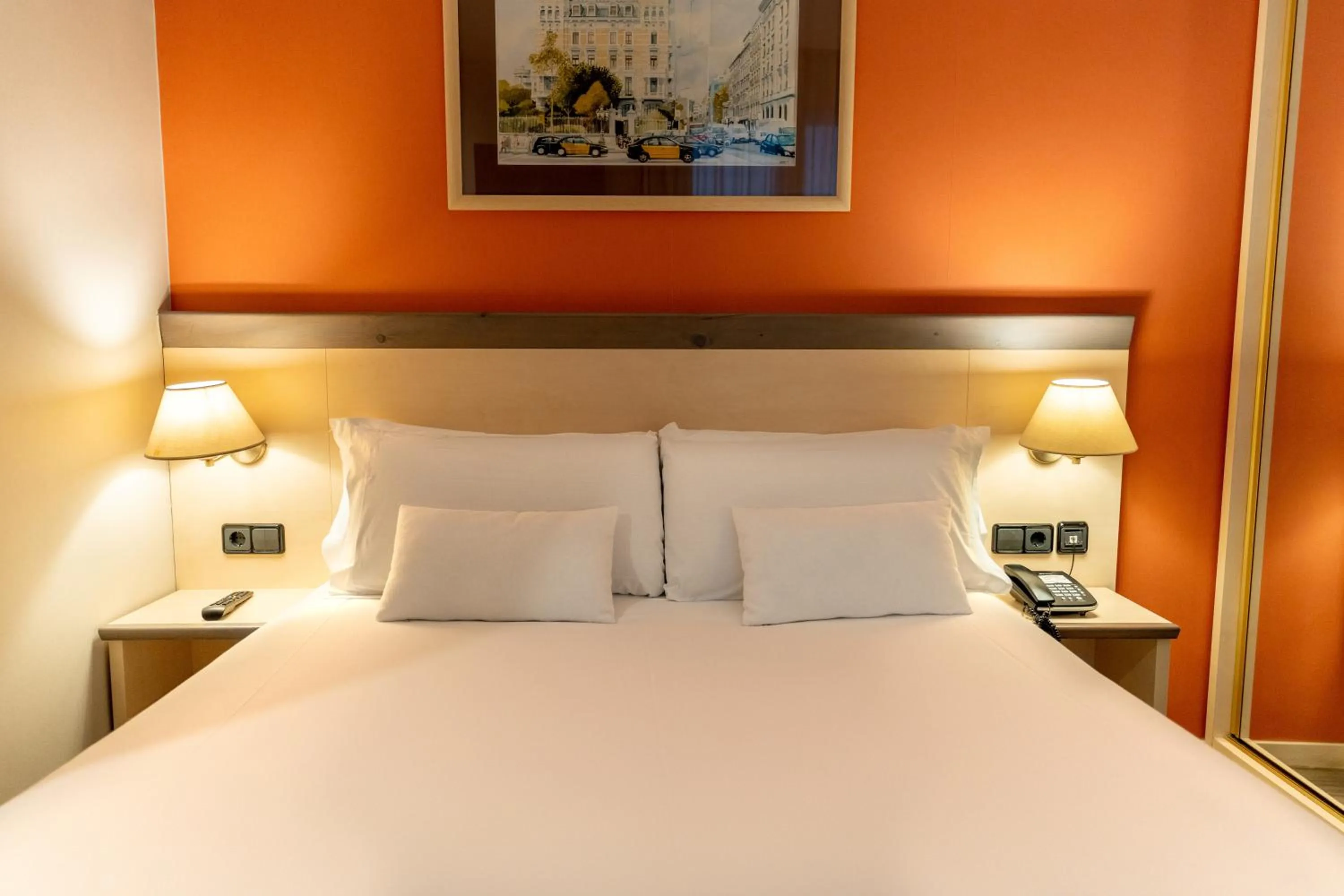 Bed in Petit Palace Trencadís