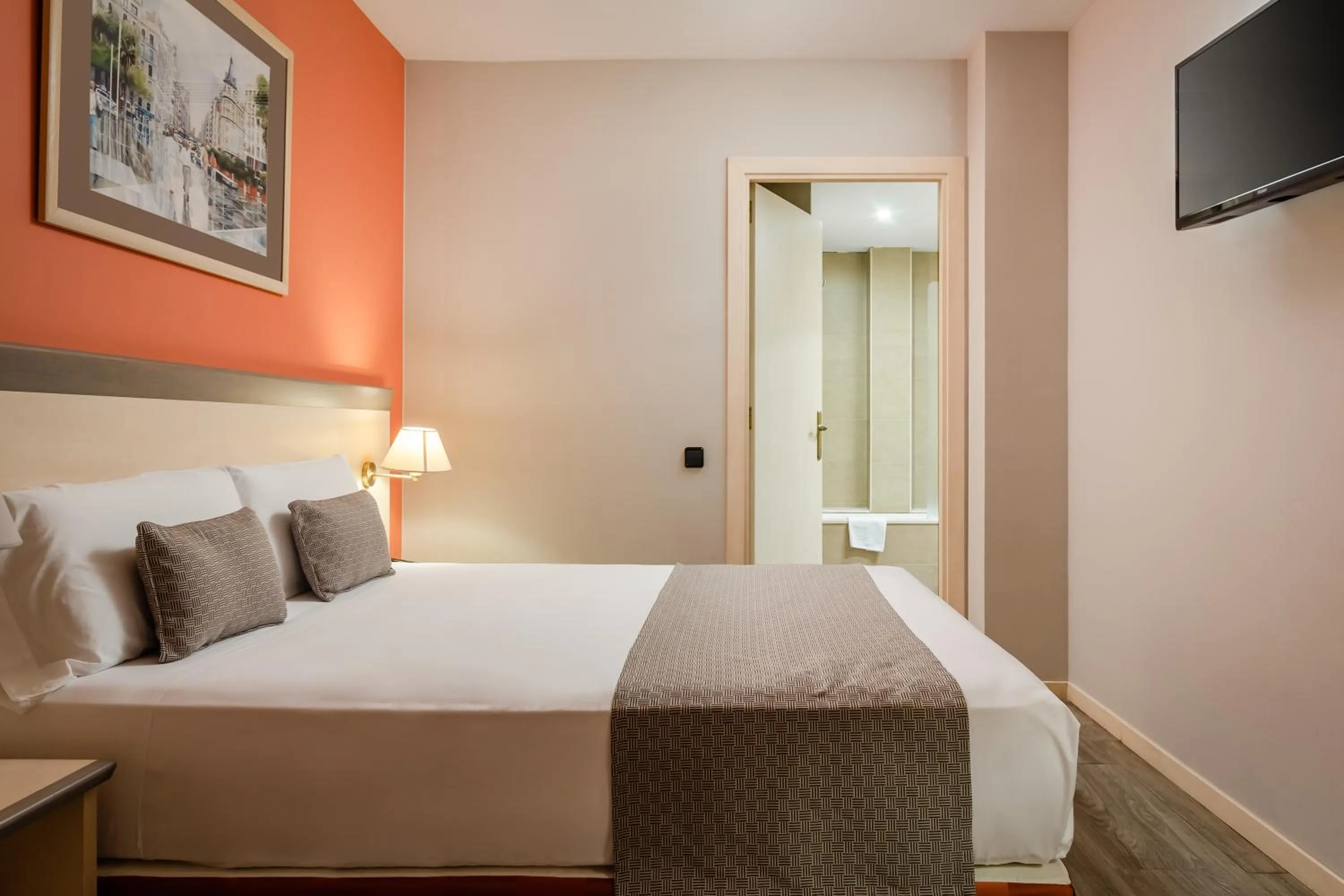 Bed in Petit Palace Trencadís