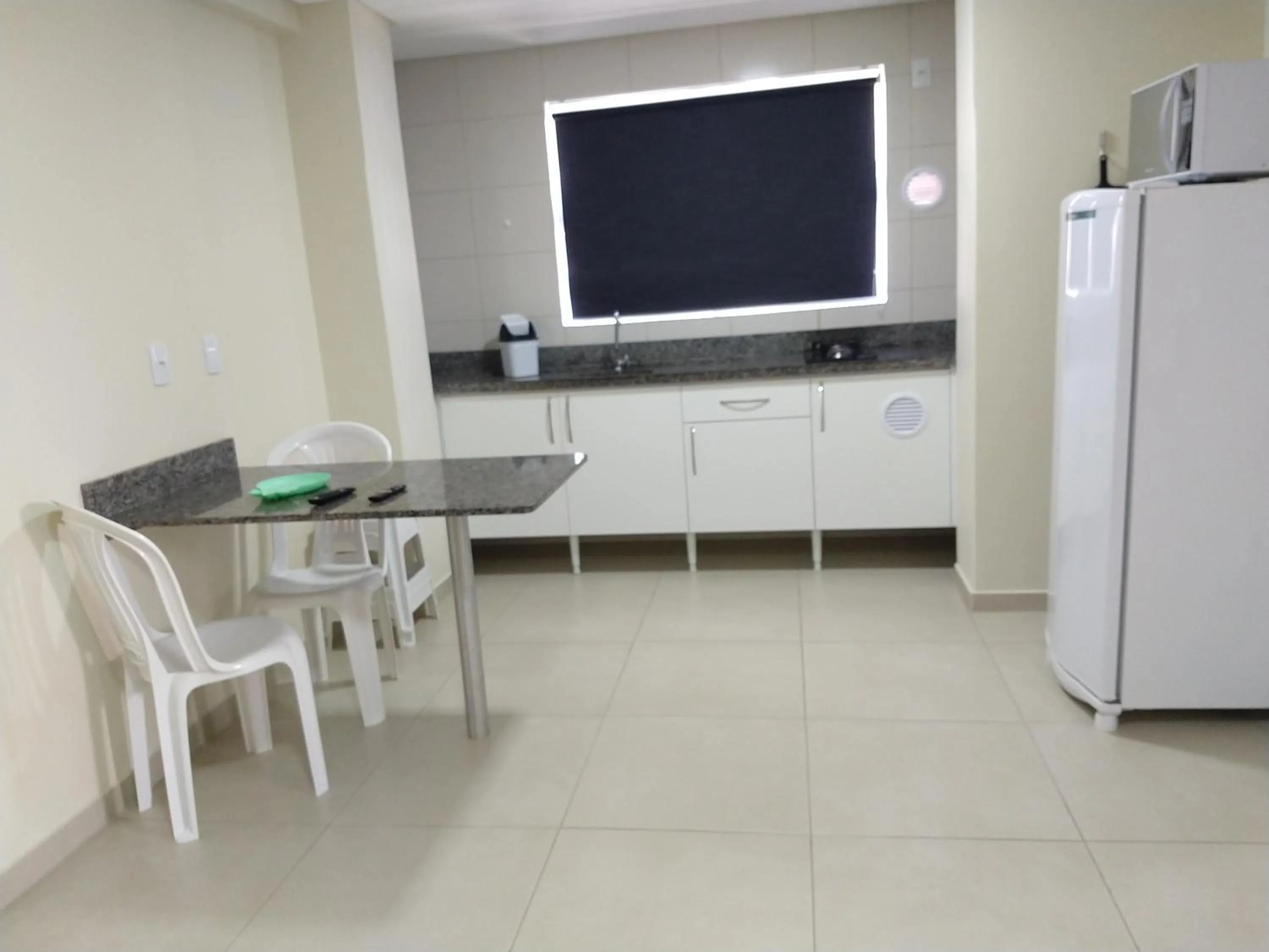 Kitchen or kitchenette in Pousada Bella Bombinhas - Pé na areia