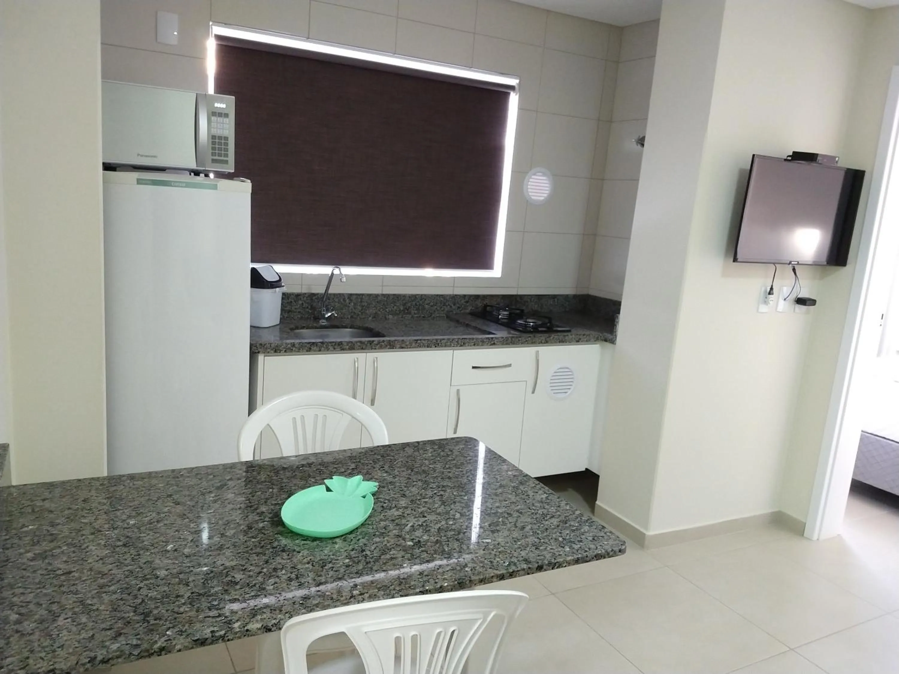 Kitchen or kitchenette in Pousada Bella Bombinhas - Pé na areia