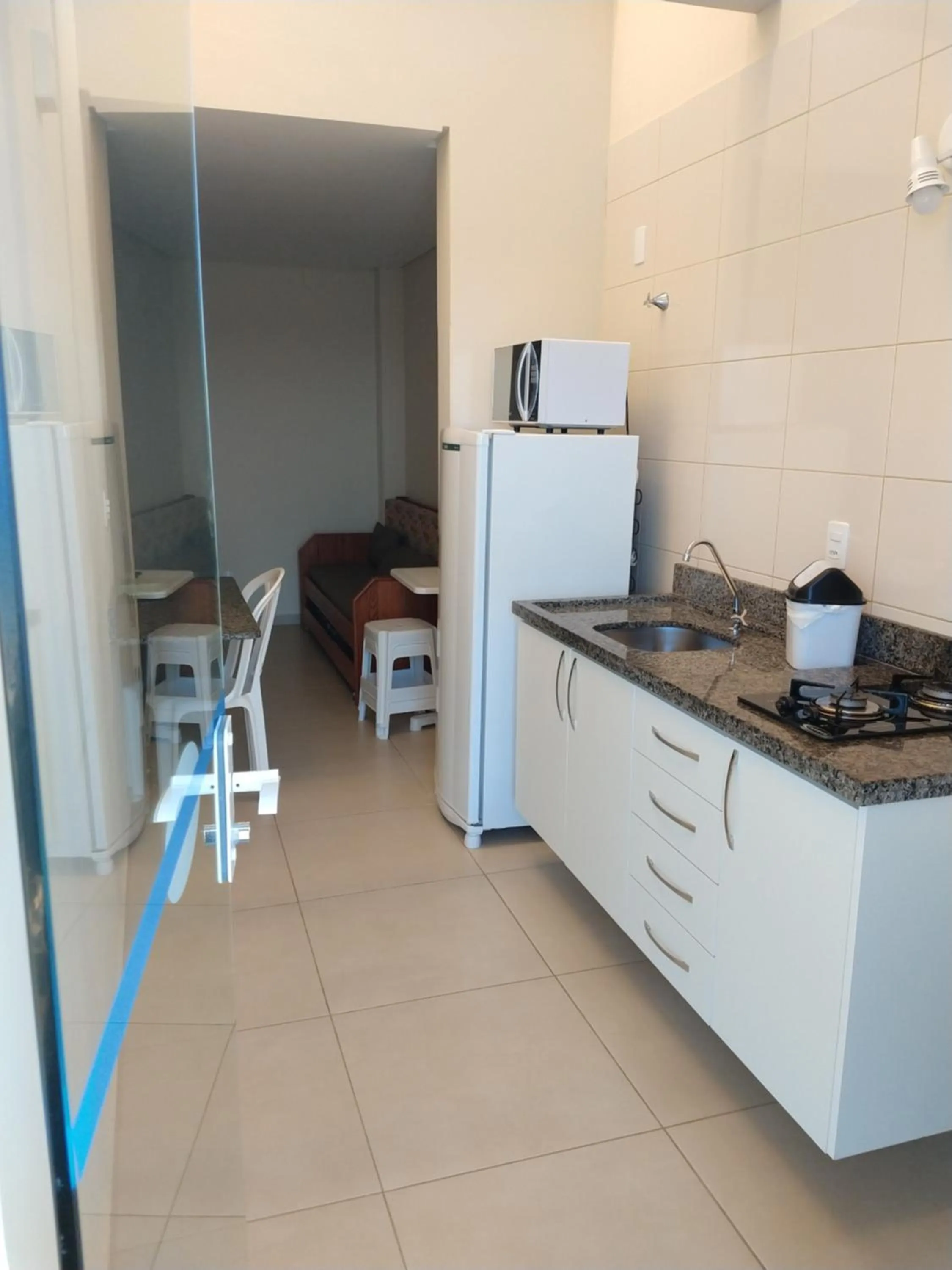 Kitchen or kitchenette in Pousada Bella Bombinhas - Pé na areia