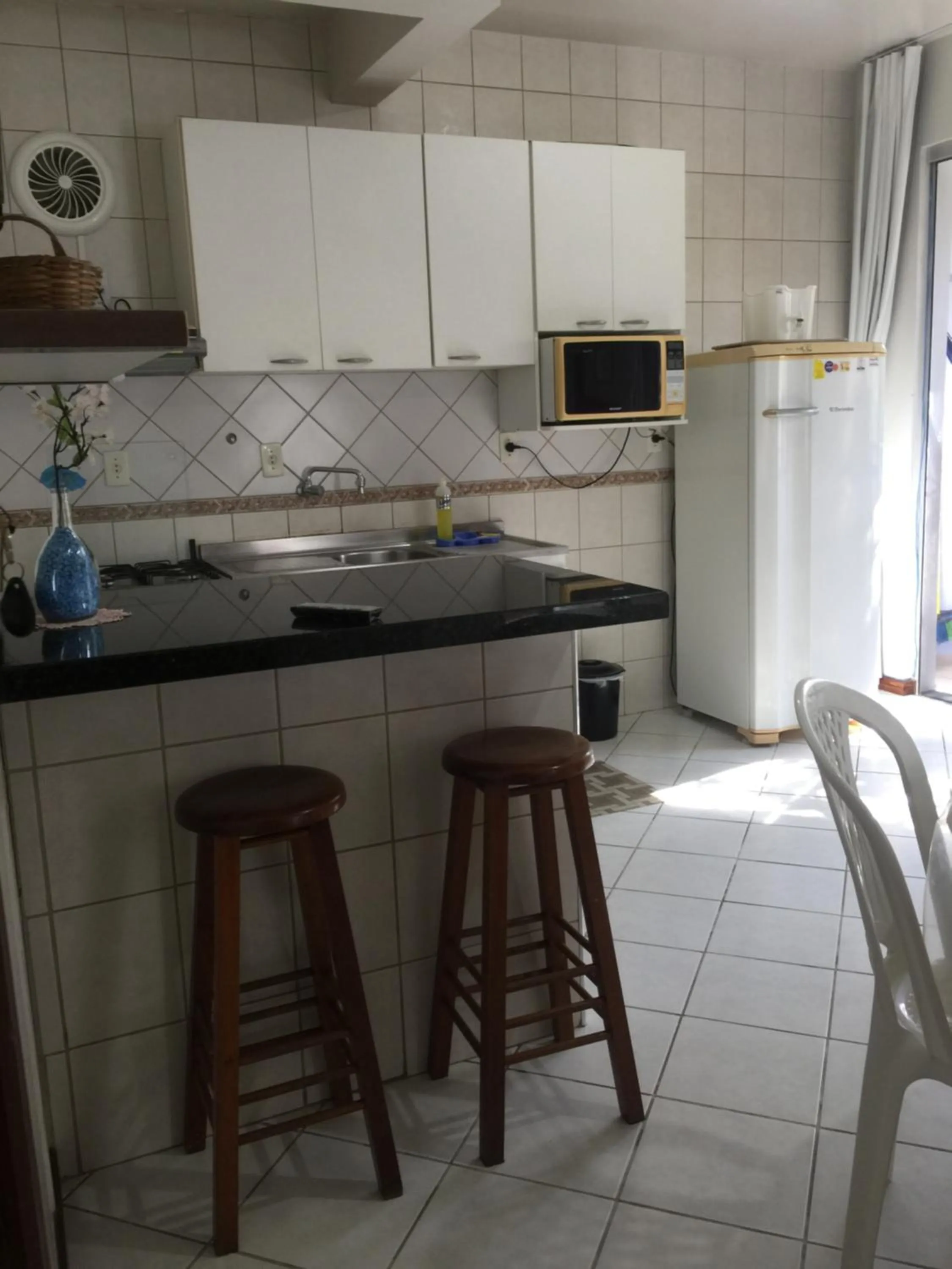 Communal kitchen in Kasato Maru Residence