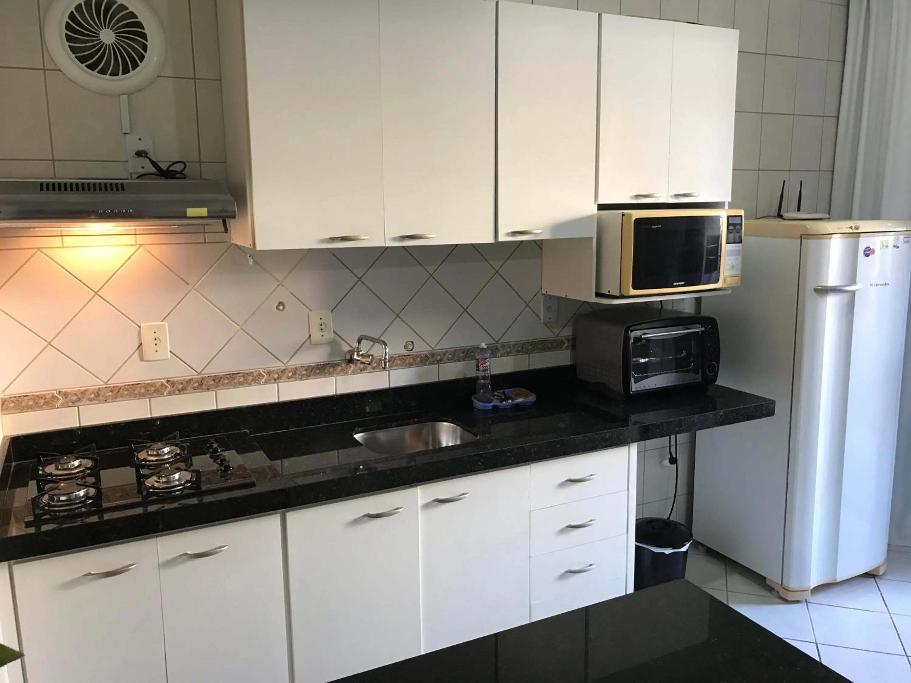 Communal kitchen in Kasato Maru Residence