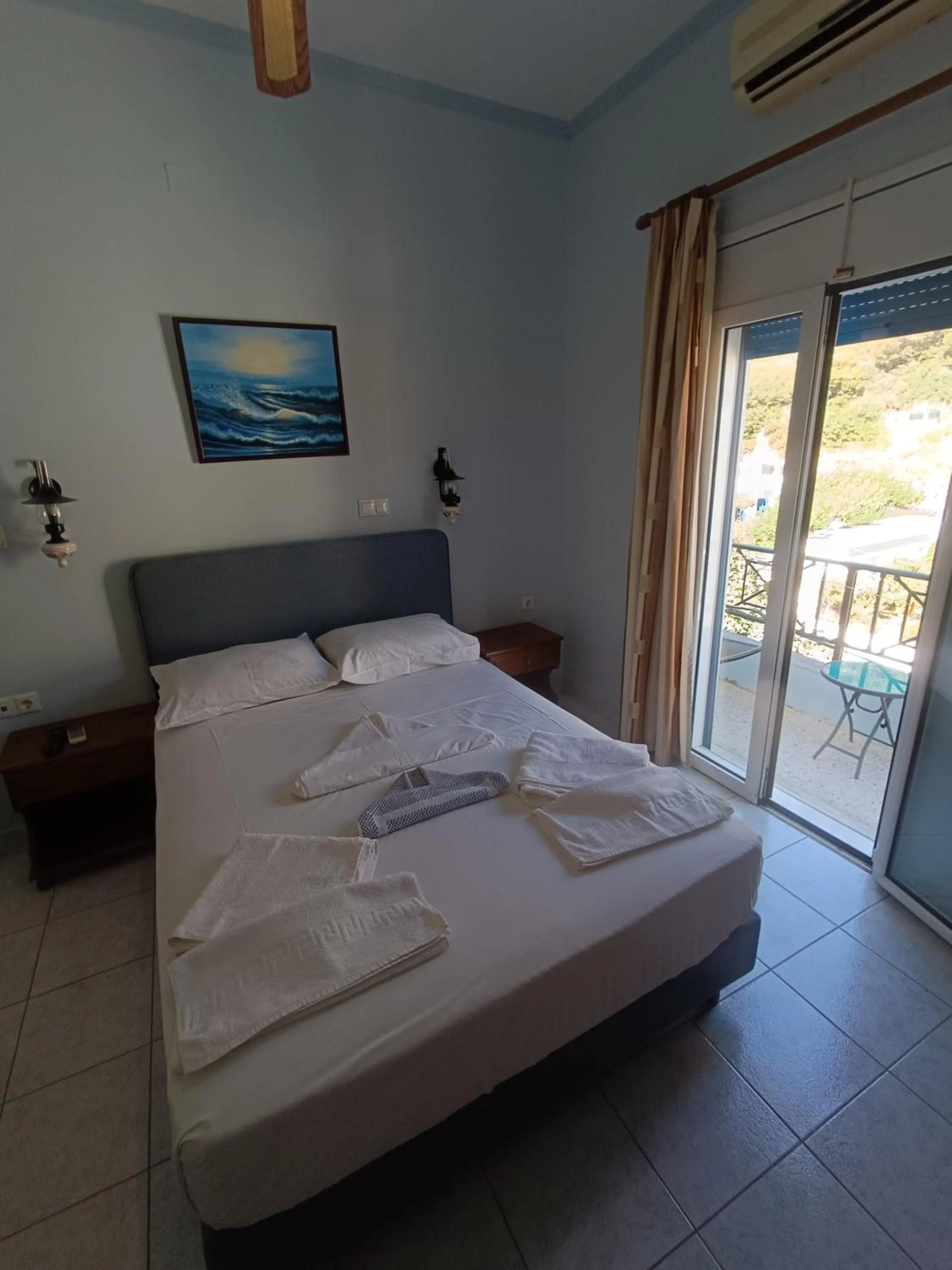 Bed in Hotel Asteria