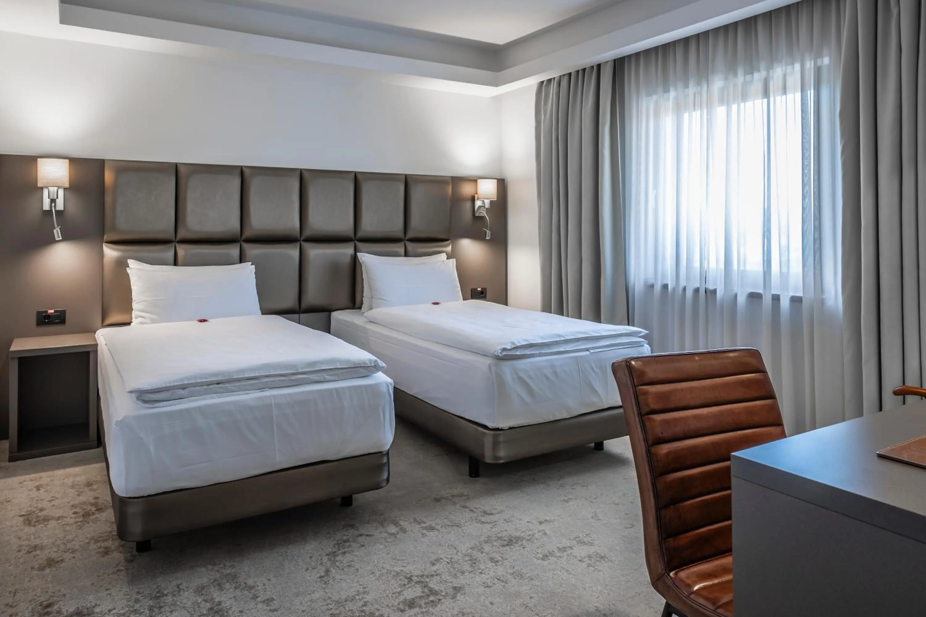 Bed in Charm Boutique Hotel