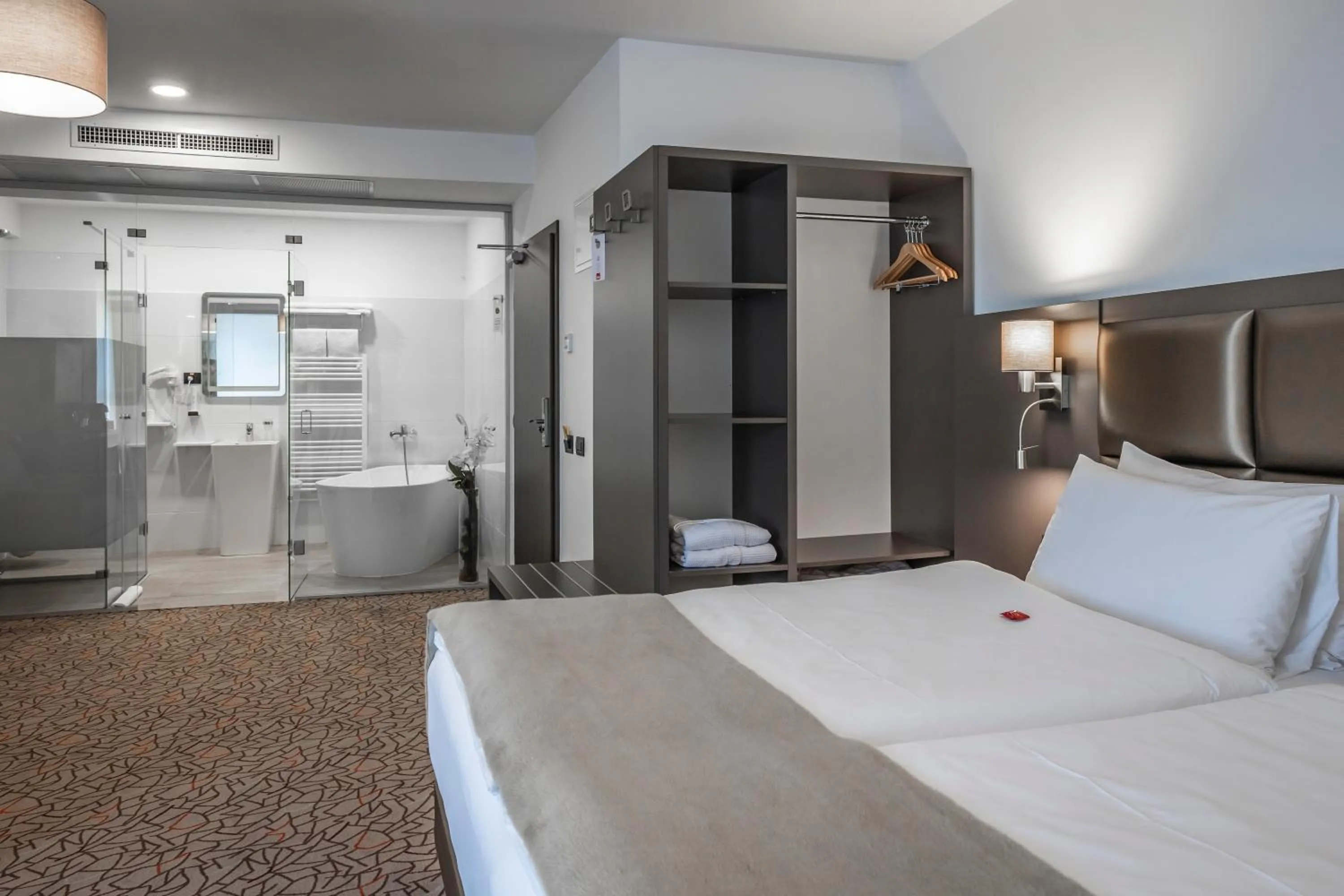 Photo of the whole room, Bed in Charm Boutique Hotel