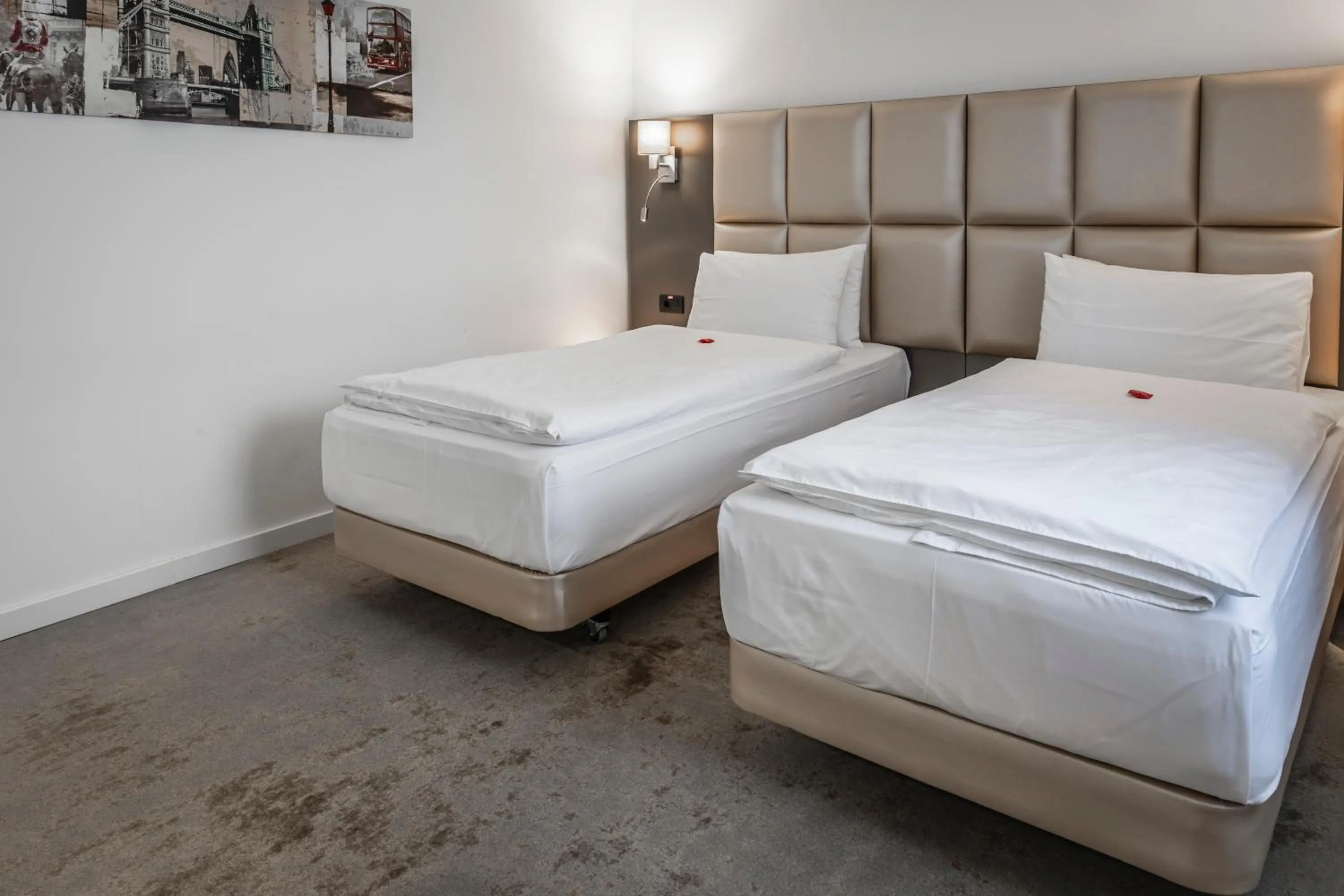 Bed in Charm Boutique Hotel