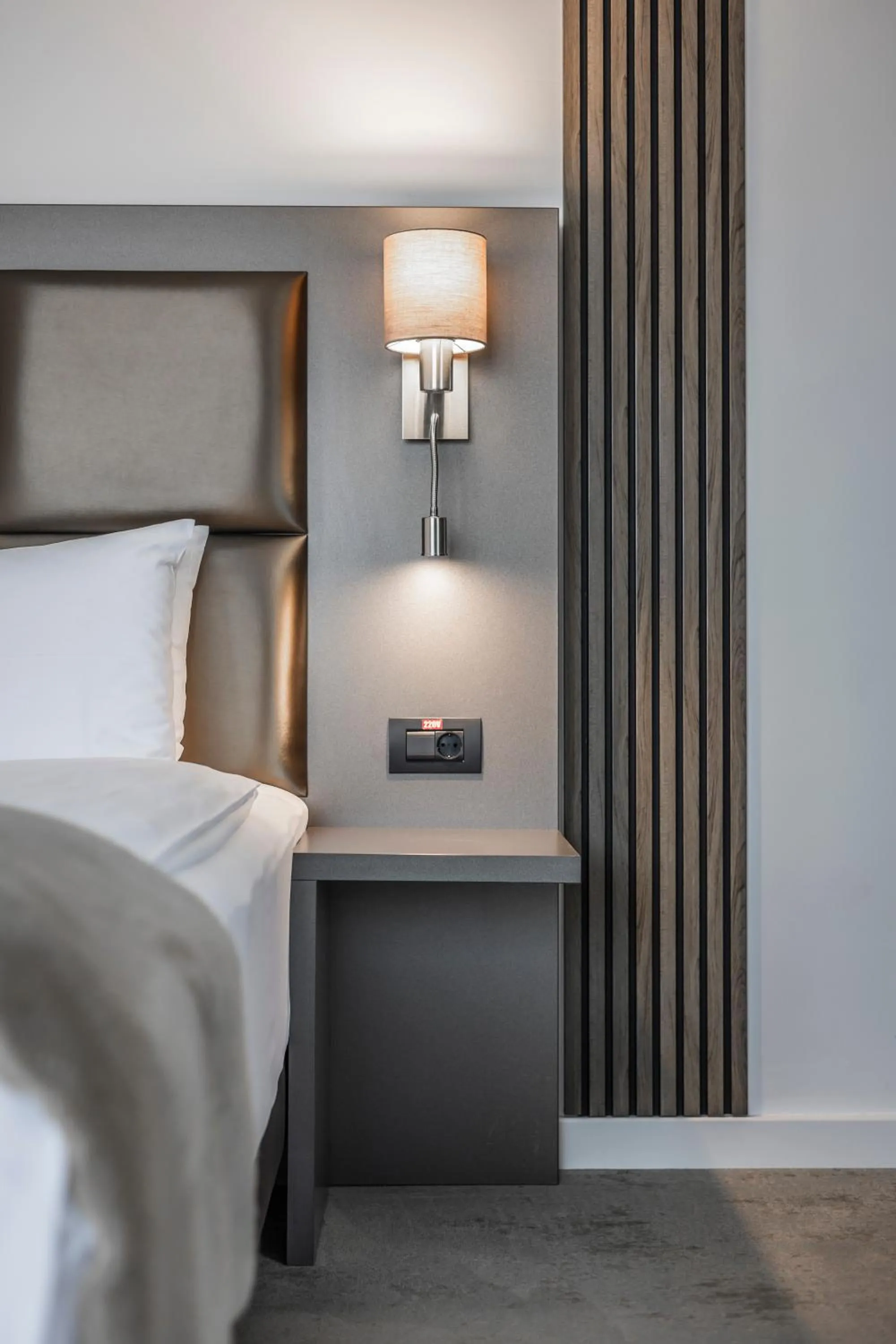 Bed in Charm Boutique Hotel