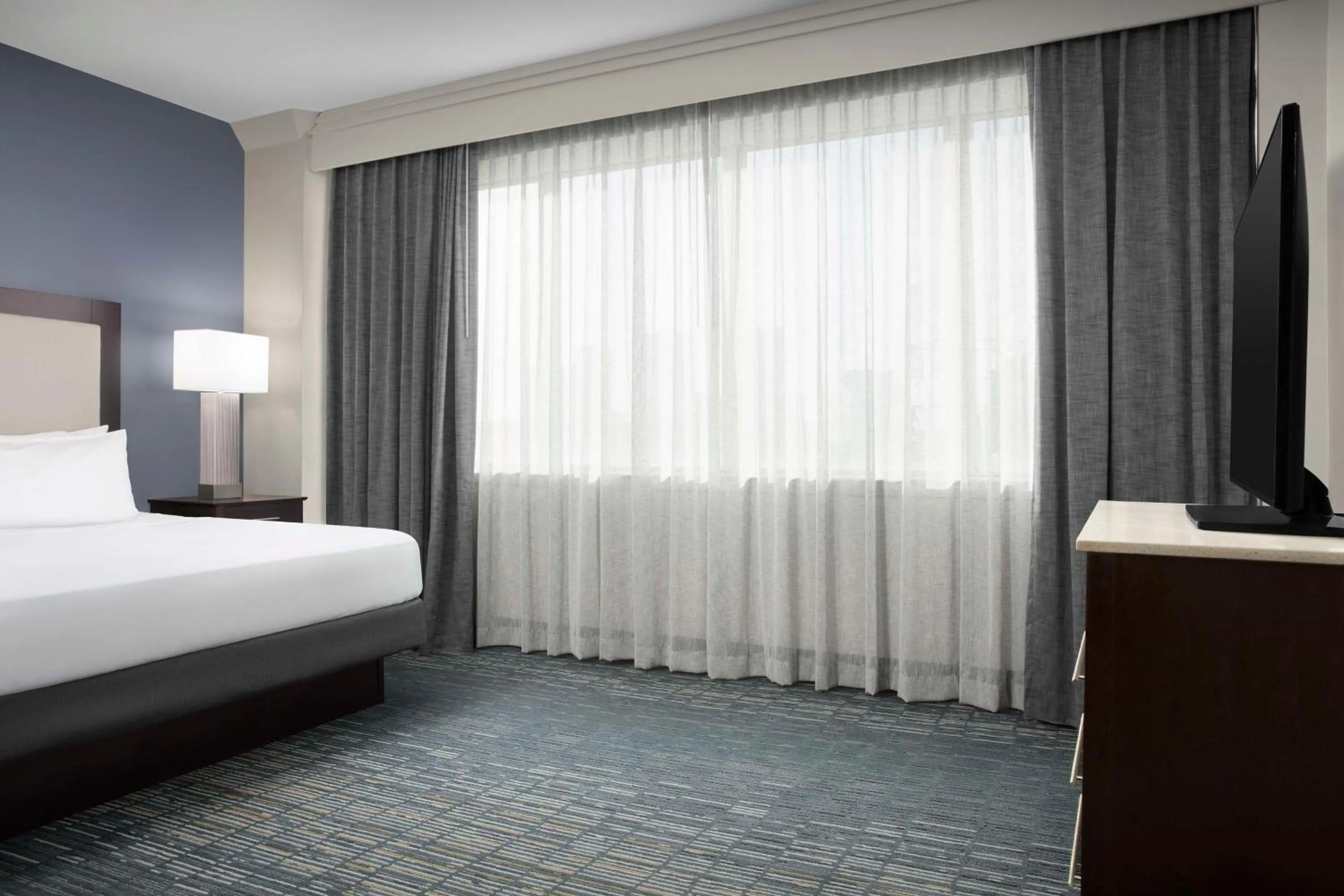 Bed in Homewood Suites Dallas Downtown