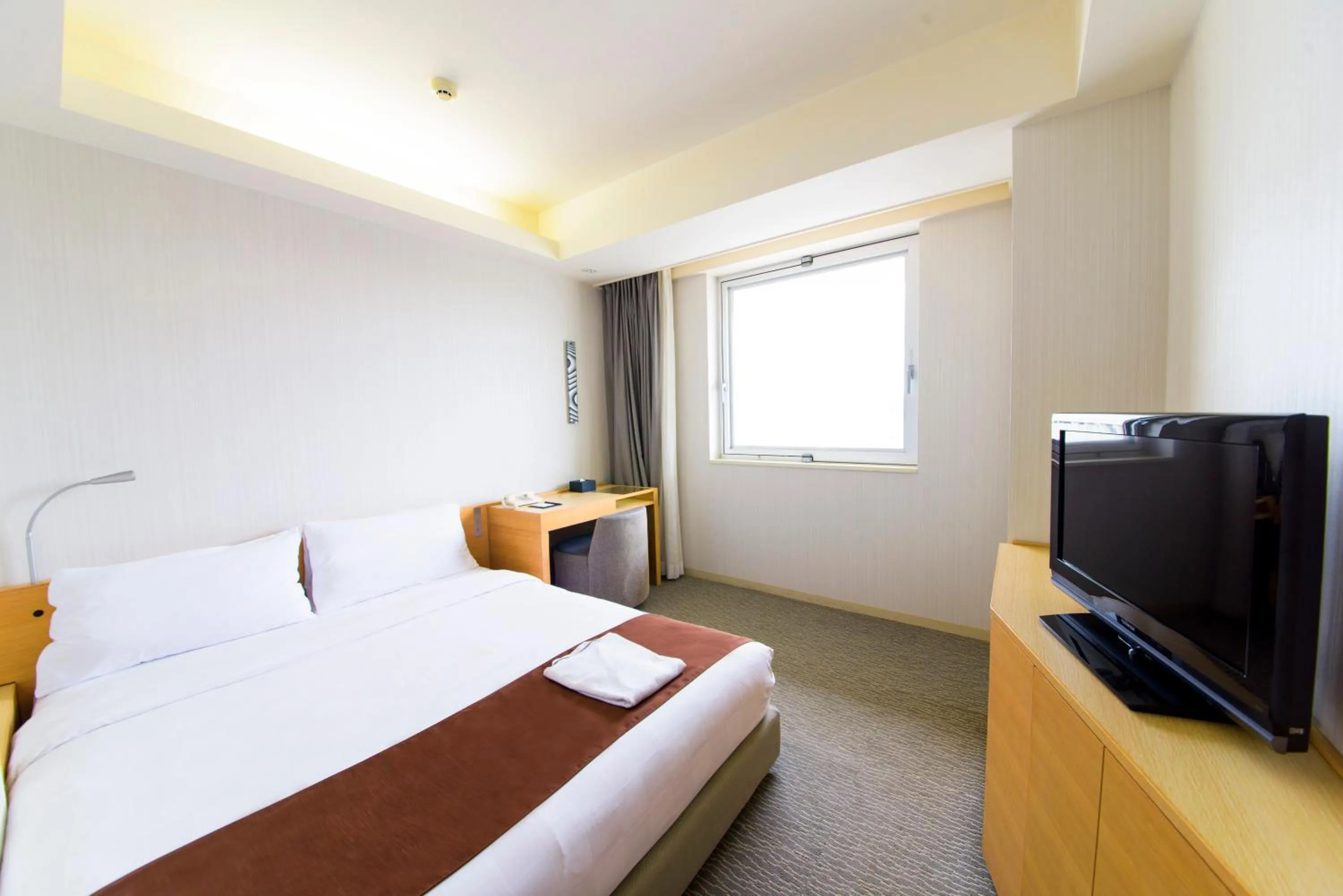 Day, Bed in Naha Tokyu REI Hotel