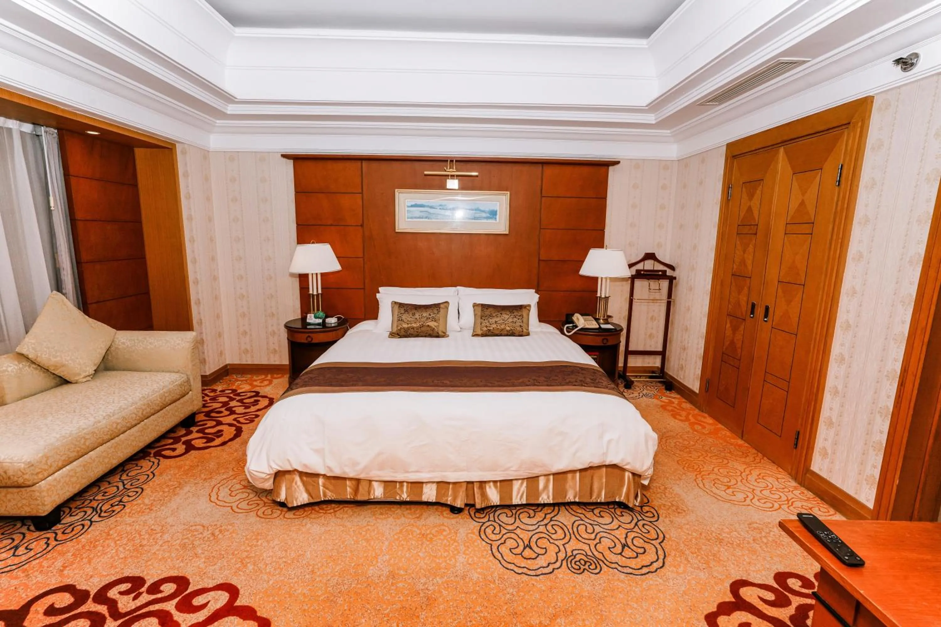 Bed in Ruishi Hotel Dalian